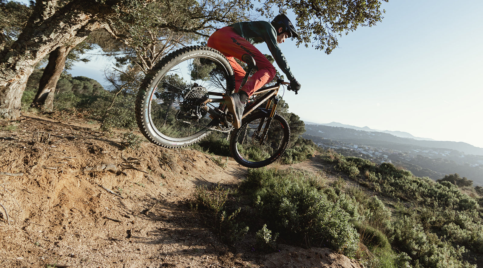 Image 406081339770 enduro rider jumping on a track on an offroad setting