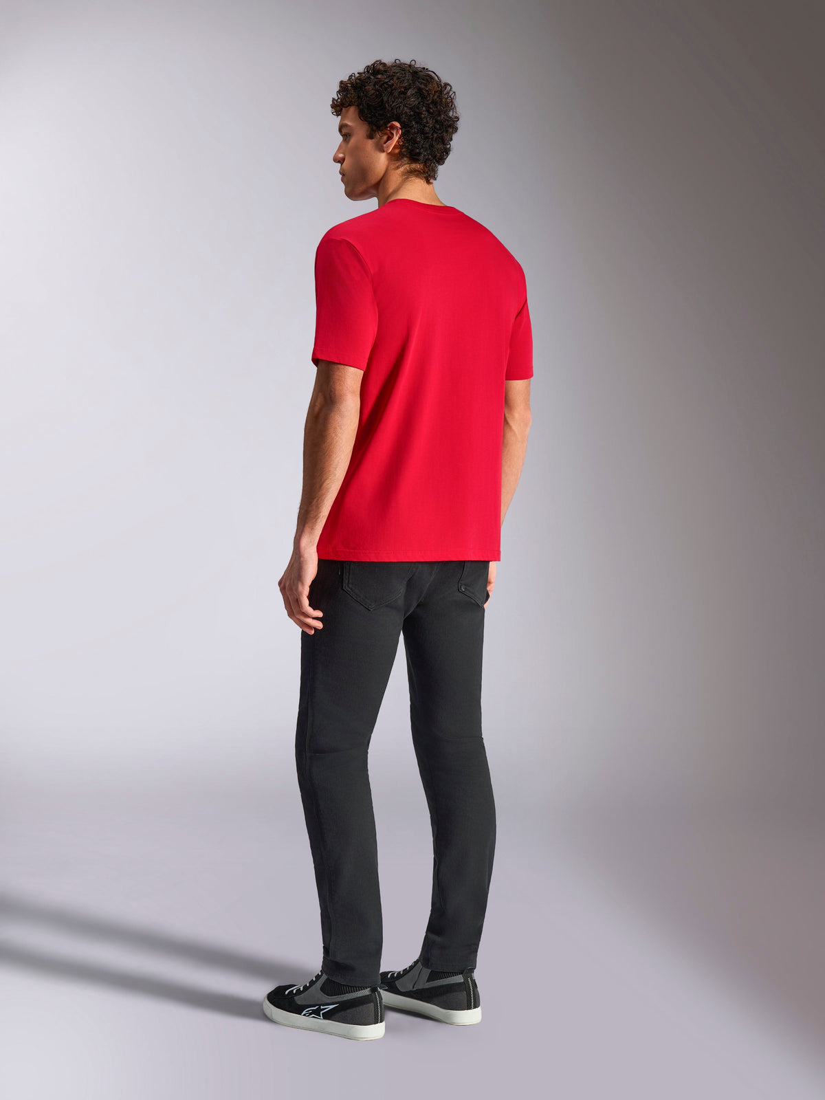 Alpinestars Ride 4.0 CSF Tee, Short Sleeve T-Shirt, Red, Back view on model wearing black pants and sneakers, casual motorsport streetwear