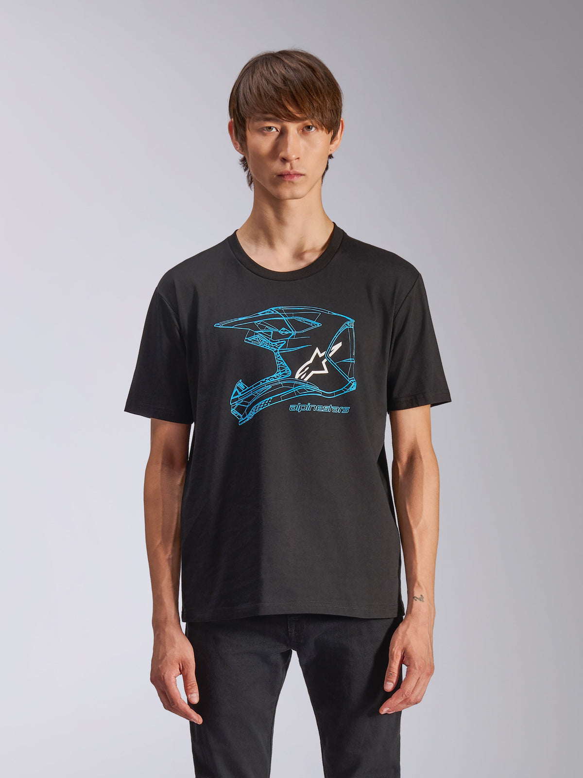 Alpinestars CSF Tee, Short Sleeve T-Shirt, Black, Blue Motocross Helmet Graphic featuring white Astars logo, casual motorsport-inspired streetwear worn by model