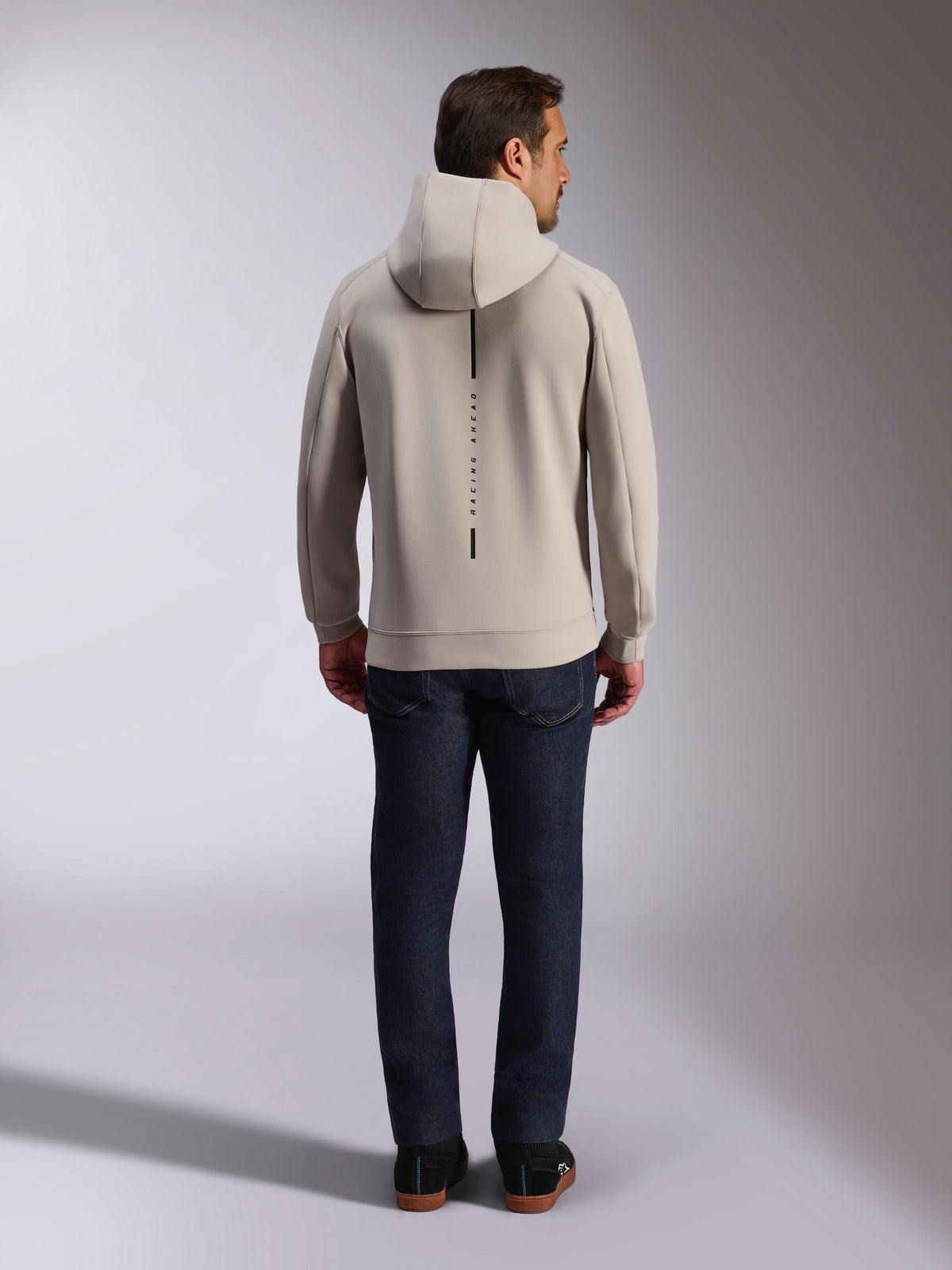 Alpinestars Insight Hoodie, back view, cement gray, vertical black stripe with 'RACING AHEAD' text, double face fleece, casual motorsport-inspired streetwear