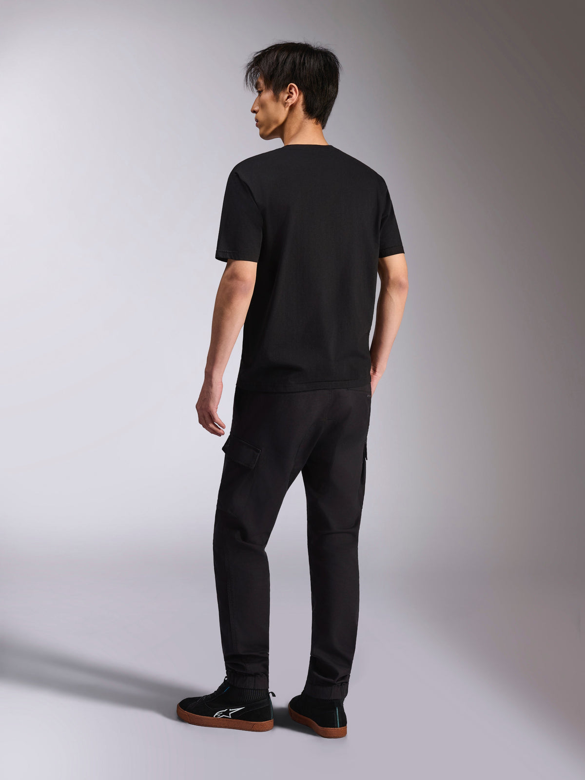 Alpinestars Alter Oversized CSF Tee, Short Sleeve T-Shirt, Black, back view, worn with black pants and sneakers, oversized fit, casual lifestyle streetwear