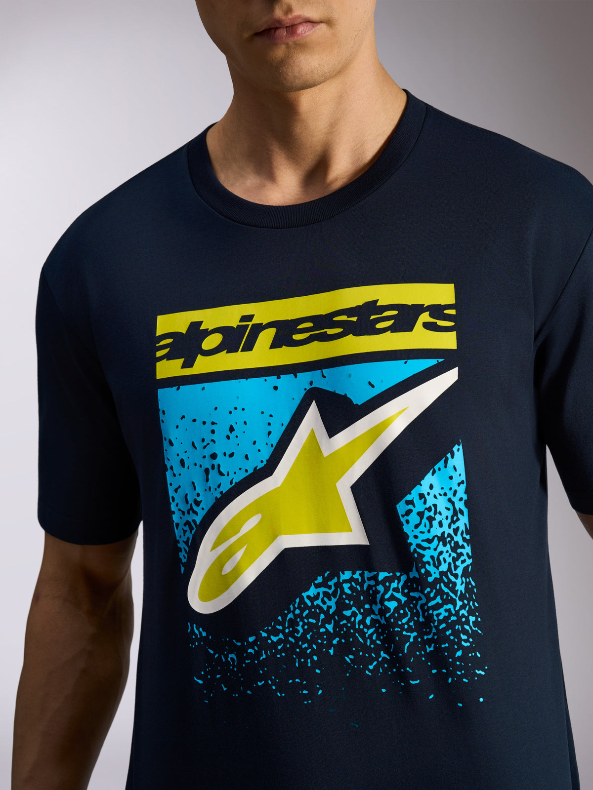 Alpinestars Noka CSF Tee, Short Sleeve T-Shirt, Navy, Yellow Alpinestars wordmark and A-star logo with blue MX gradation graphic, Casual Motorsport Sportswear