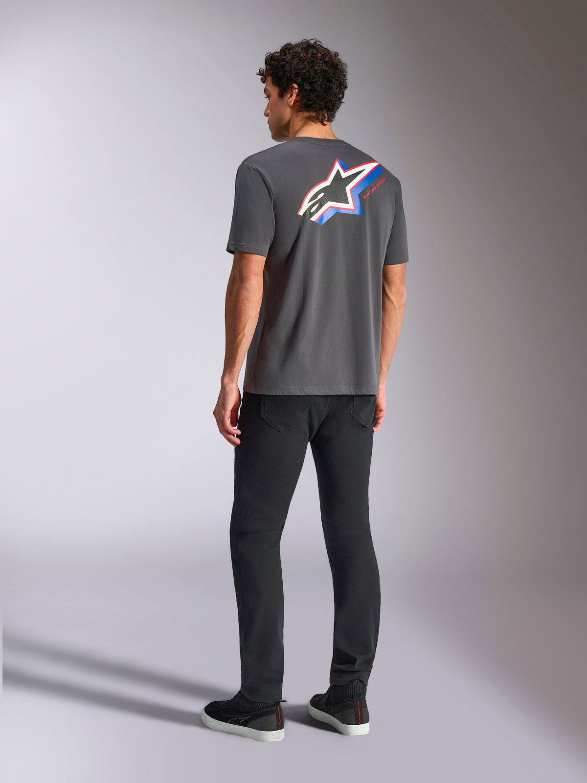 Alpinestars Angler CSF Tee, Short Sleeve T-Shirt, Charcoal, vibrant multi-color Astars logo on back with red and blue stripes, casual motorsport streetwear
