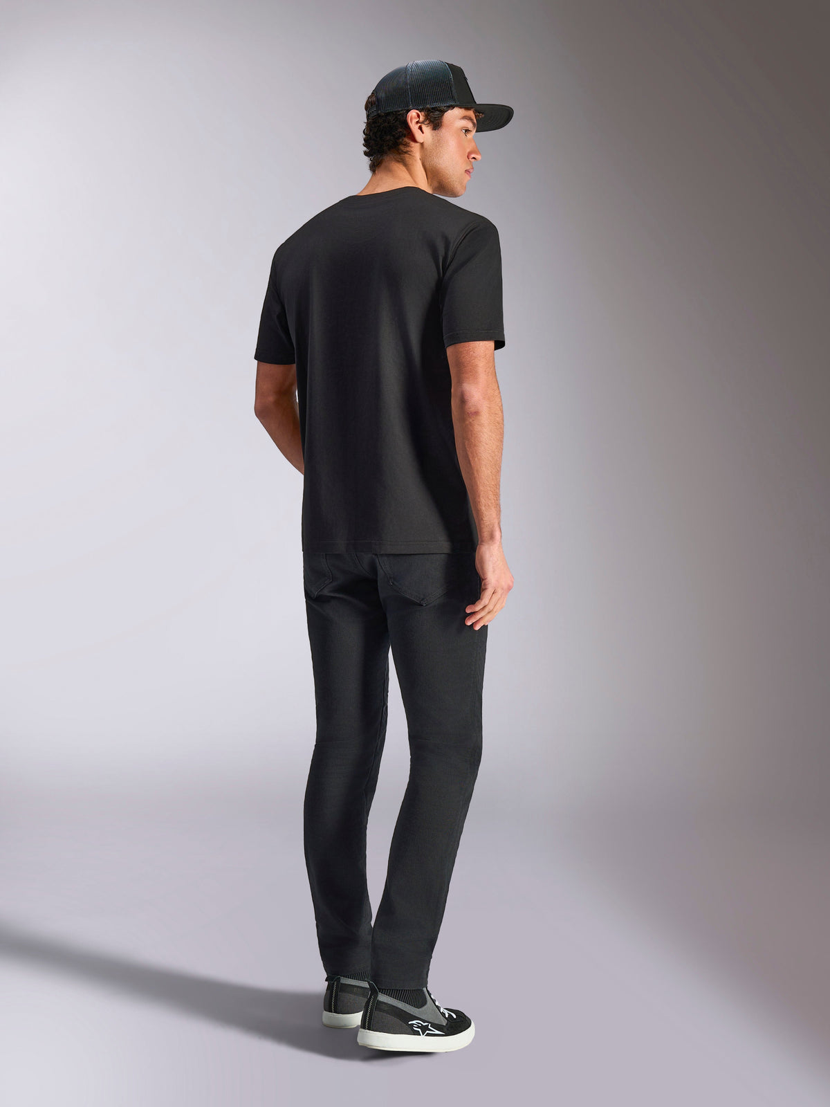 Alpinestars Verdure Camo CSF Tee, Short Sleeve T-Shirt, Black, back view shown on model with black pants and trucker hat, casual motorsport-inspired streetwear