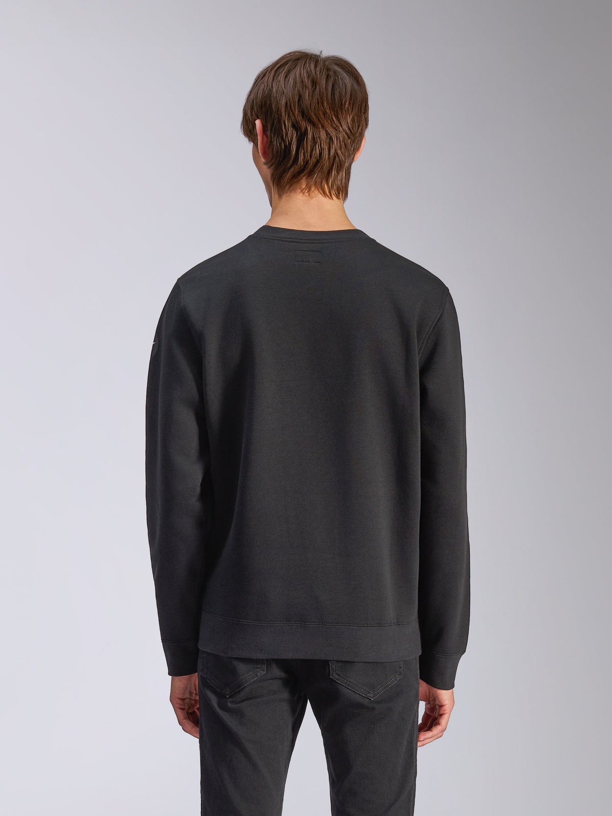 Alpinestars Bettern Crew, Crew Neck Sweatshirt, Black, back view on model, featuring ribbed cuffs and hem, casual motorsport streetwear