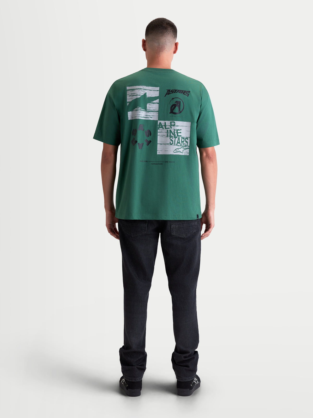 Alpinestars Checkback Oversized CSF T-Shirt, groen sportswear T-shirt met korte mouwen, achteraanzicht met opvallende checkergraphic op de rug, oversized fit, katoen-polyestermix.