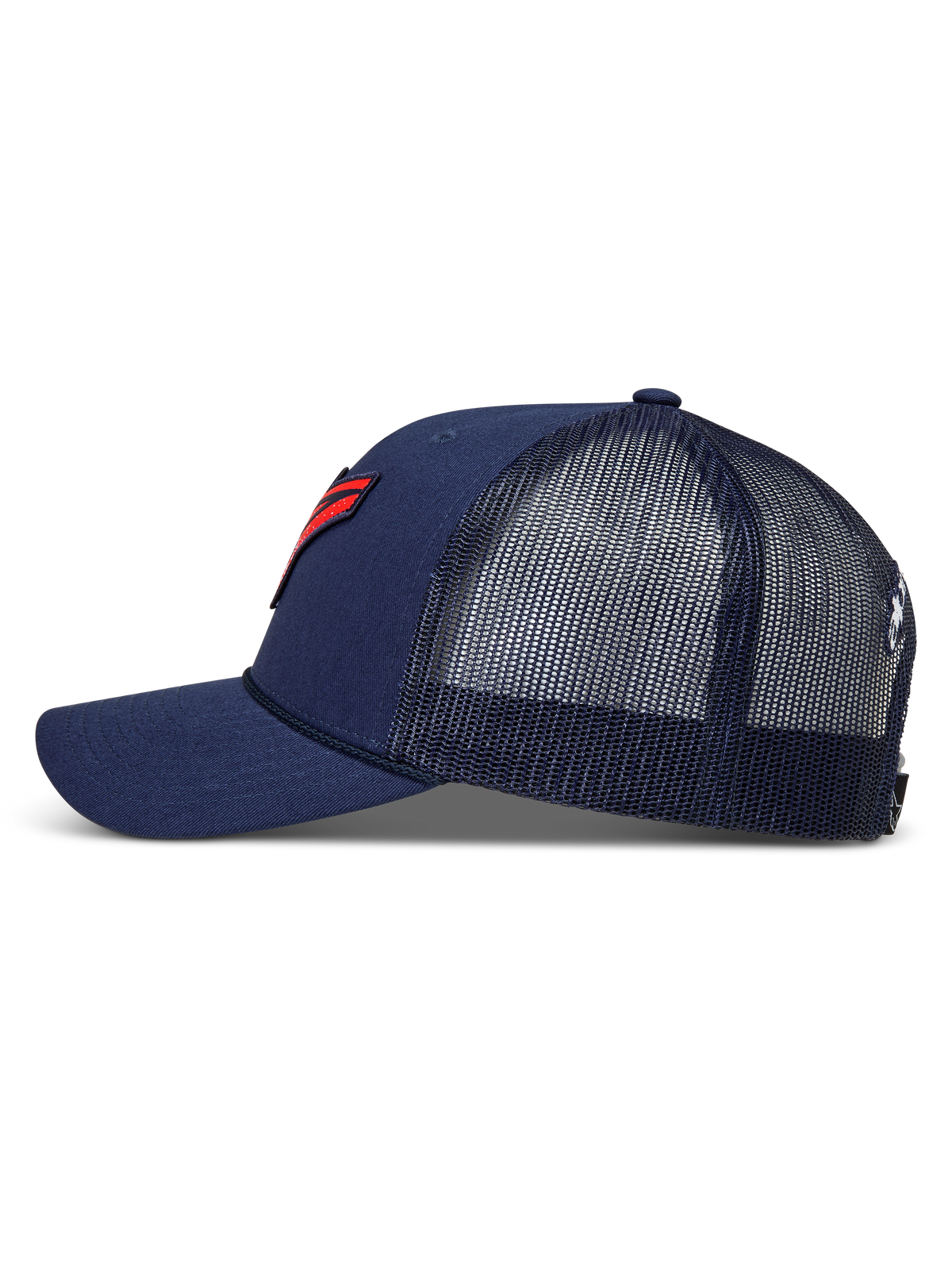 Alpinestars Meteorite Trucker hoed, navyblauwe truckerpet met mesh achterkant, gebogen klep en rode logopatch met grindtextuur.