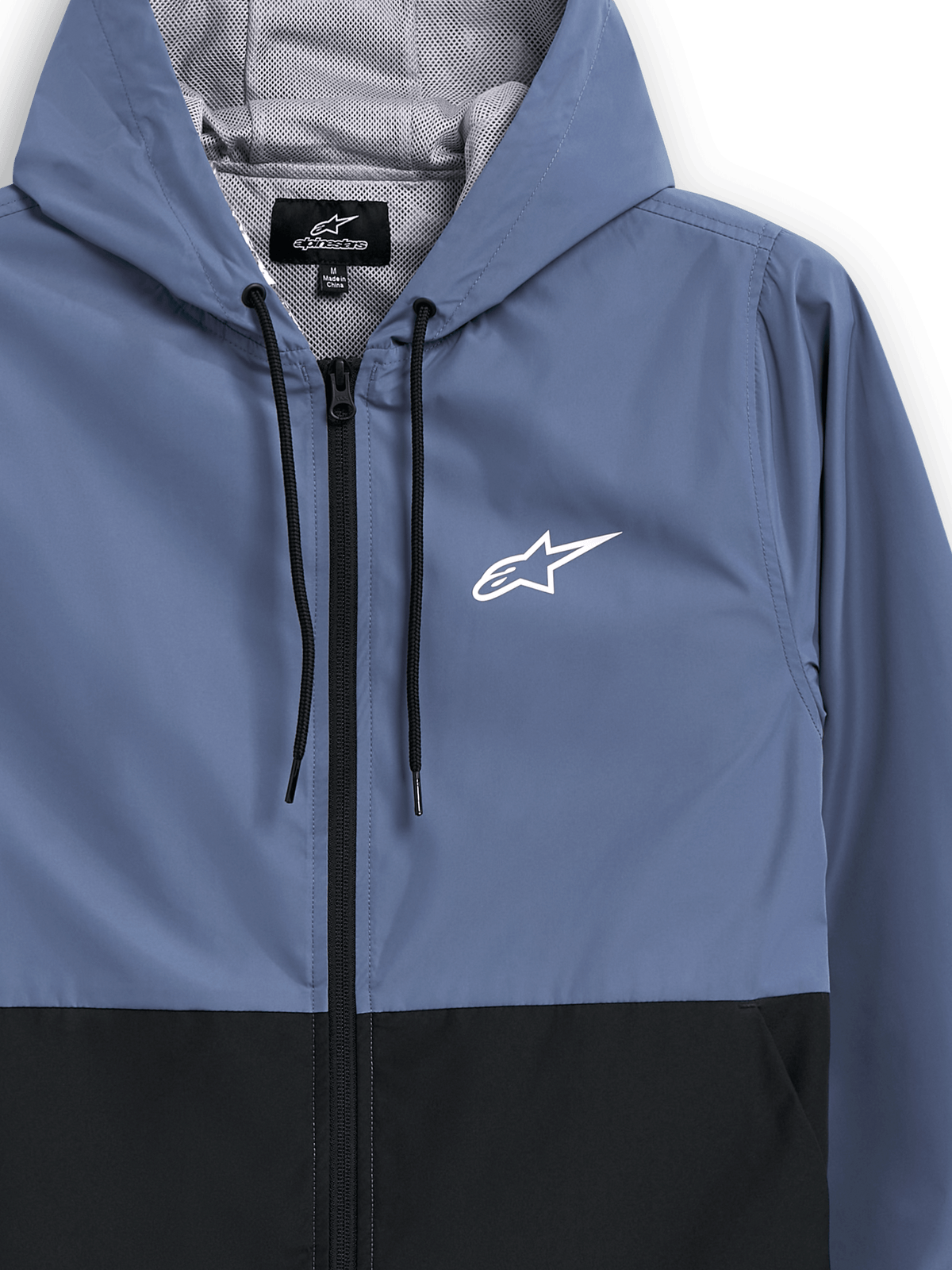 Alpinestars Speeder Windbreaker Jas, leiblauw en zwart, lichtgewicht windbreaker met capuchon, mesh voering met zwarte trekkoorden, wit Alpinestars sterlogo op de borst, geblokkeerd ontwerp, casual motorsport-geïnspireerde streetwear