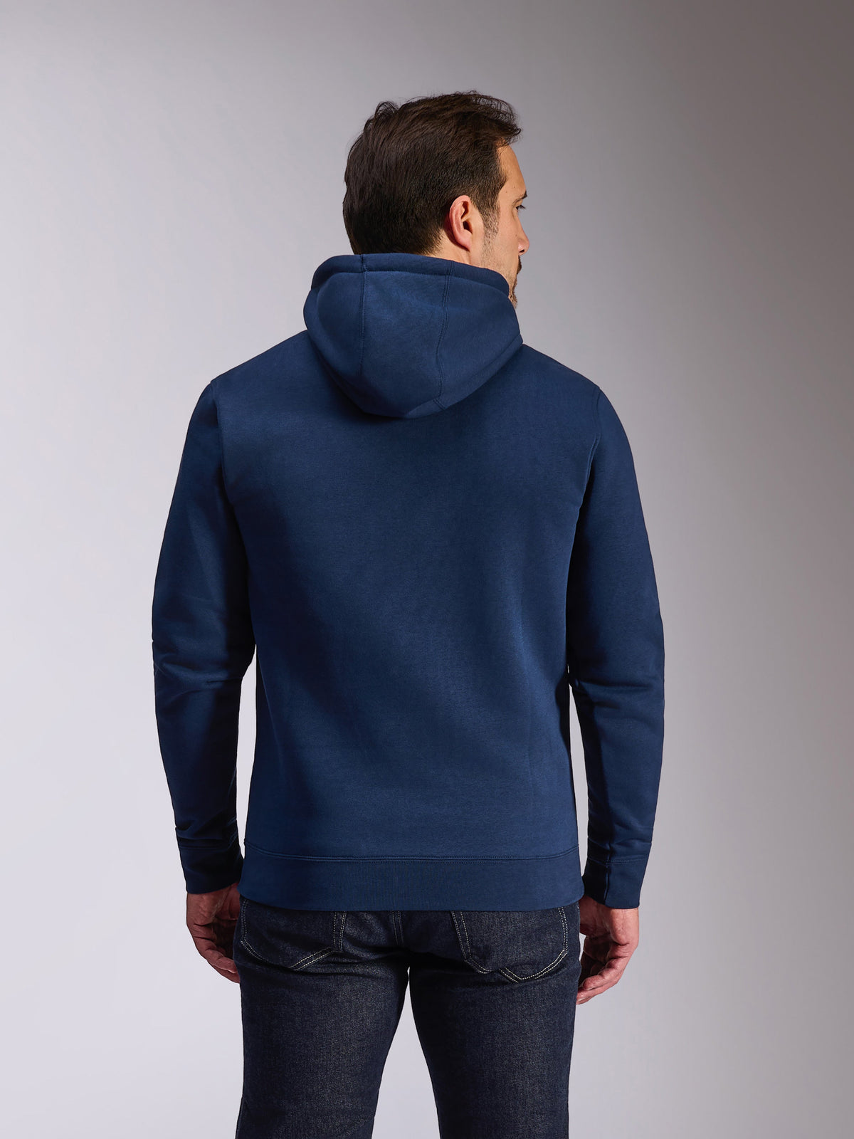 Alpinestars Ride V3 Hoodie, donkerblauwe pullover fleece, achteraanzicht met effen blauw ontwerp, jersey-gevoerde capuchon, geribbelde manchetten en zoom, casual motorsport streetwear