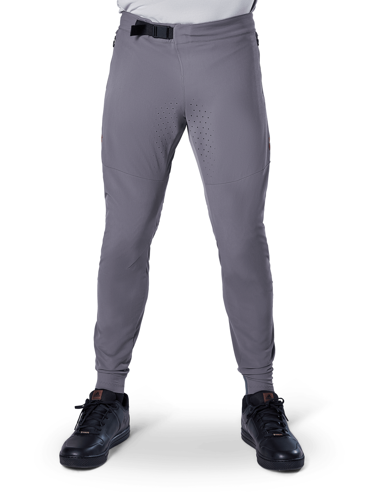 Alpinestars A-Aria Elite Pants, Mountain Bike Pants, Dark Gray, featuring laser perforations on inner thighs for ventilation and a magnetic buckle closure at the waist, performance fit with tapered legs worn with black athletic shoes