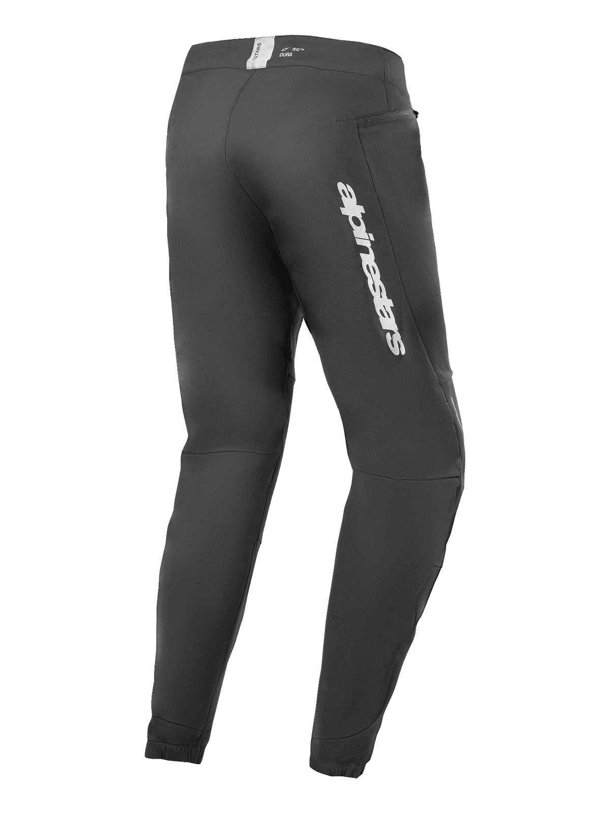 Alpinestars A-Dura Elite broek, mountainbikebroek, zwart, achteraanzicht met zilveren Alpinestars-logo op de dij, zak met rits en elastische manchetten, duurzame technische uitrusting voor MTB