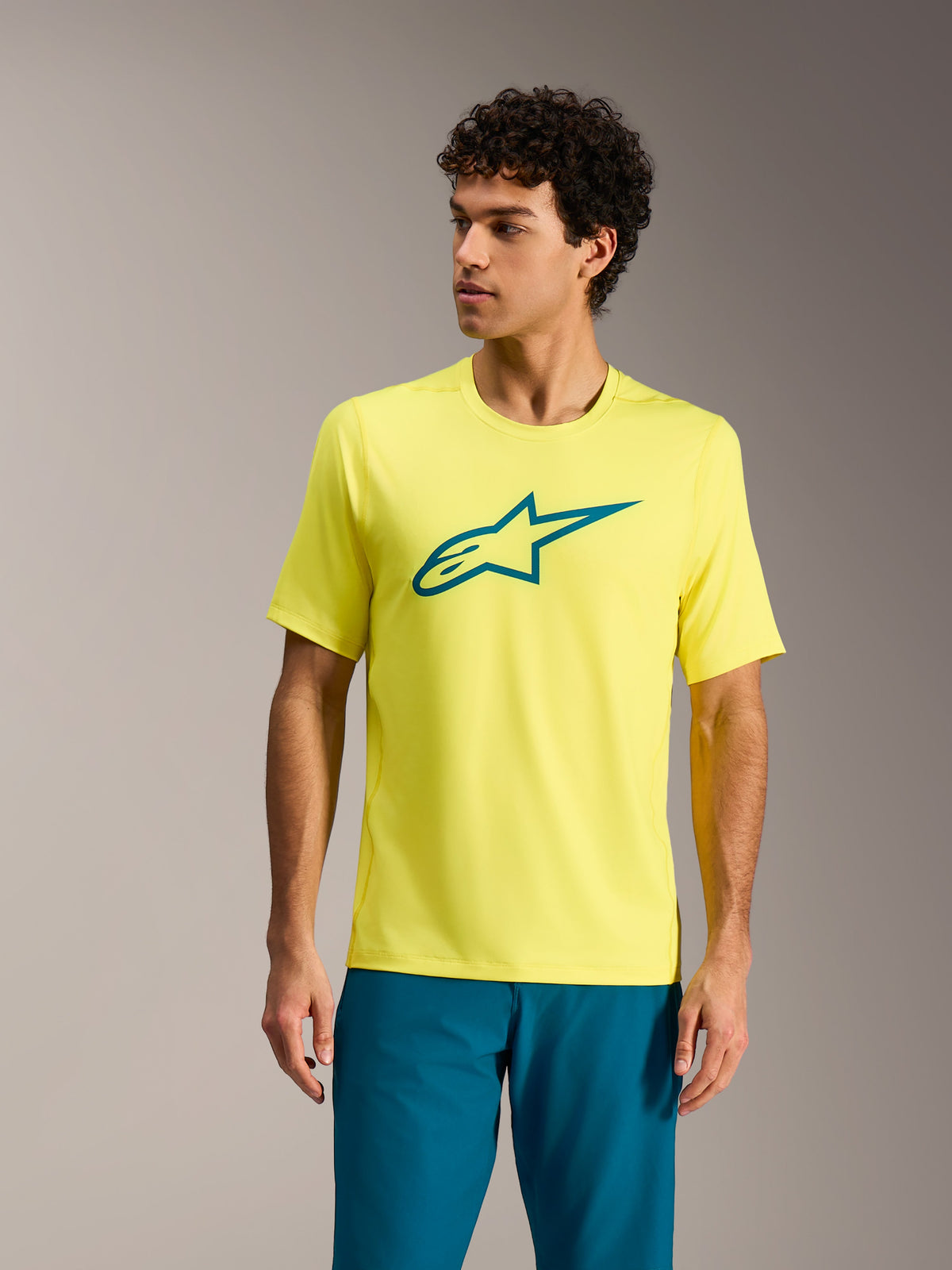 Alpinestars A-Dura Ride Jersey in Yellow Fluo, MTB-shirt met korte mouwen, blauwgroen borstlogo, technische fietskleding.