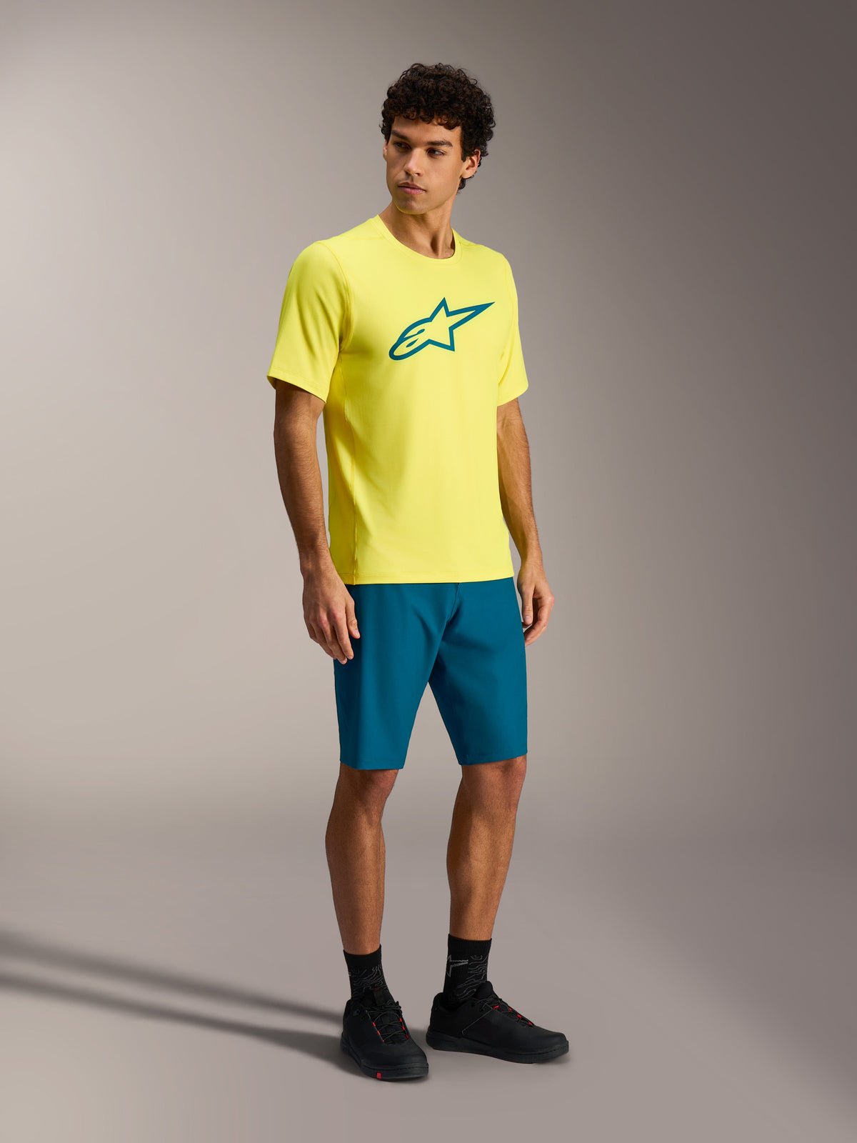 Alpinestars A-Dura Ride jersey met korte mouwen in Yellow Fluo met teal logo voor MTB trailrijden.