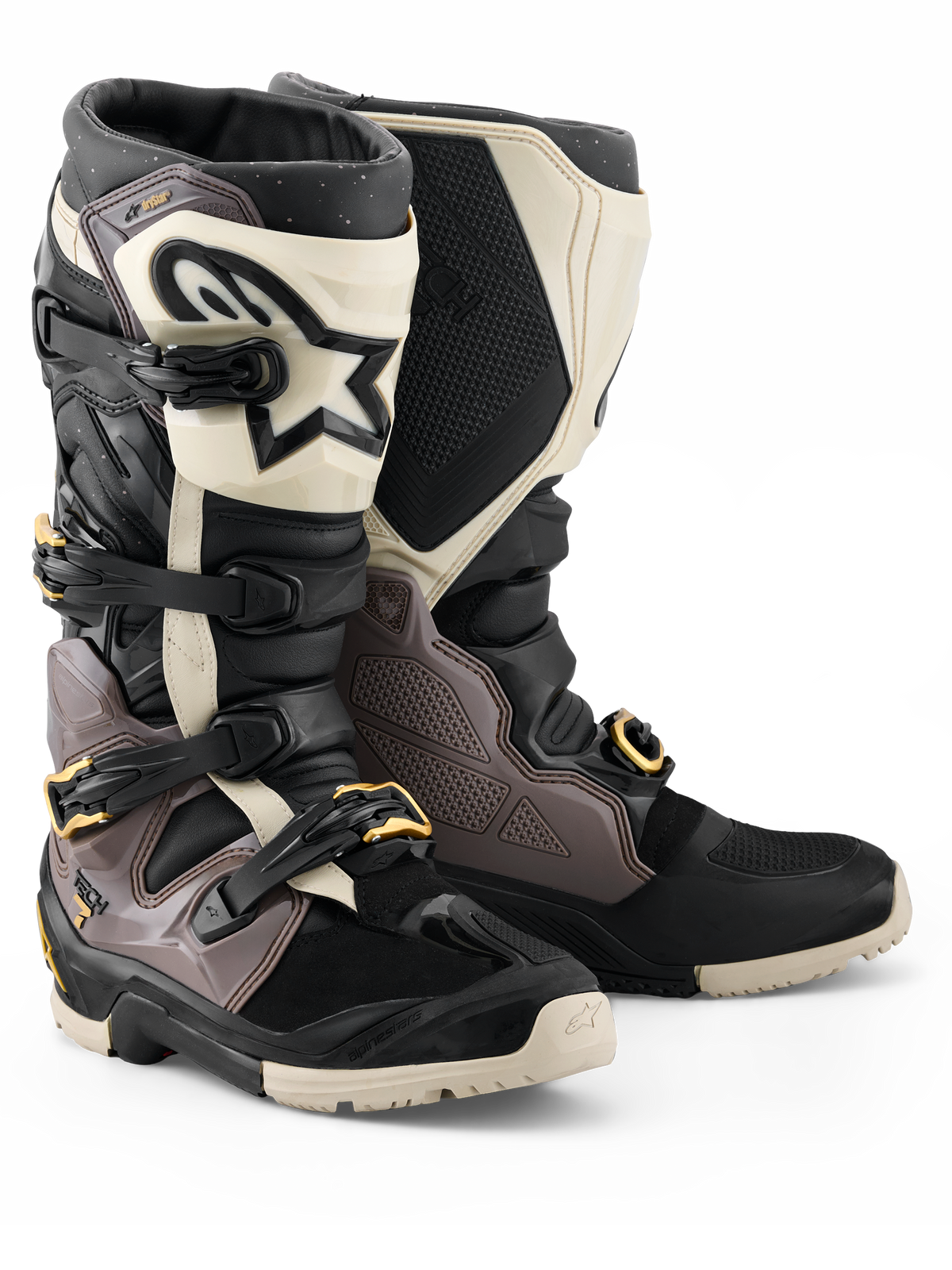 Alpinestars 2026 Tech 7 Enduro Drystar® Boots, Motocross and Enduro Boots, Black Dark Gray and Gold, featuring a rugged TPU shell, quick-release aluminum buckles with gold accents, and a large white shin plate with a black logo, designed for off-road durability.