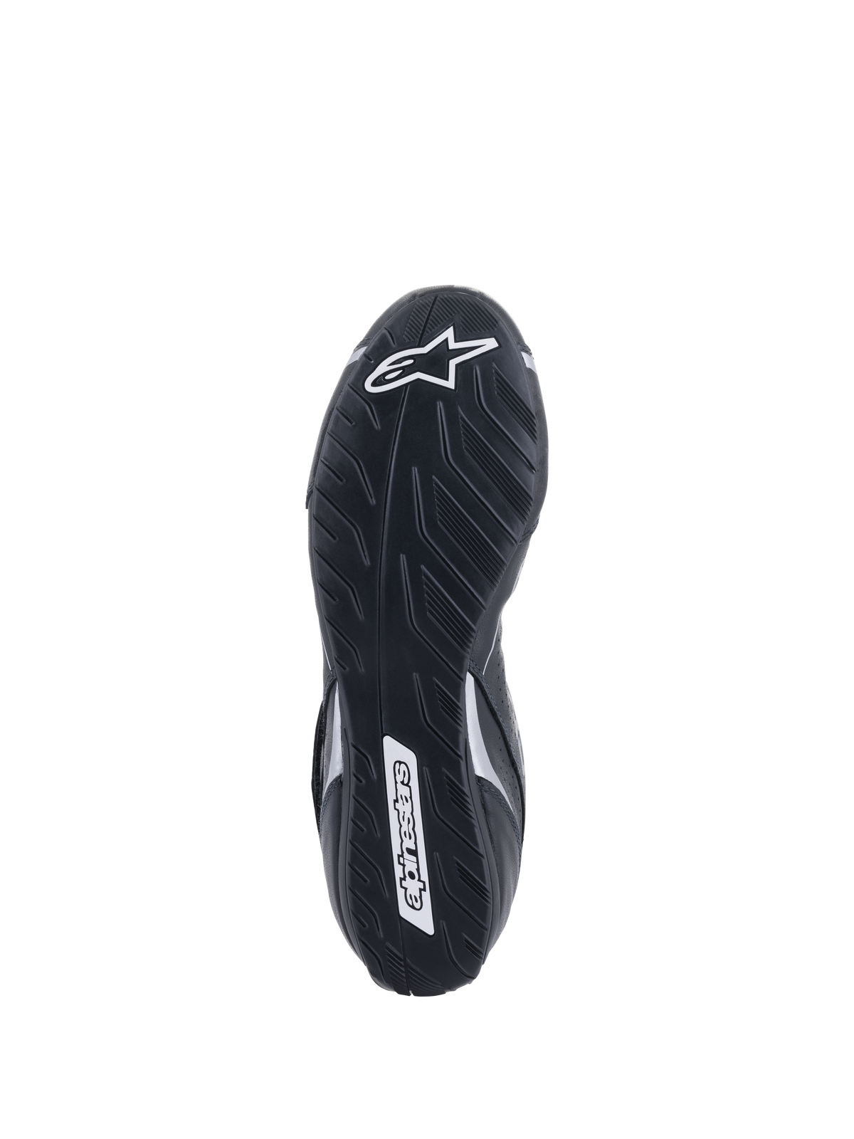Alpinestars Tech-1 T V3 FIA schoenen, onderaanzicht zool, zwart en zilver, asymmetrische rubberen buitenzool met bandenprofiel, witte Alpinestars logo-branding, dunne compound voor pedaalgevoeligheid