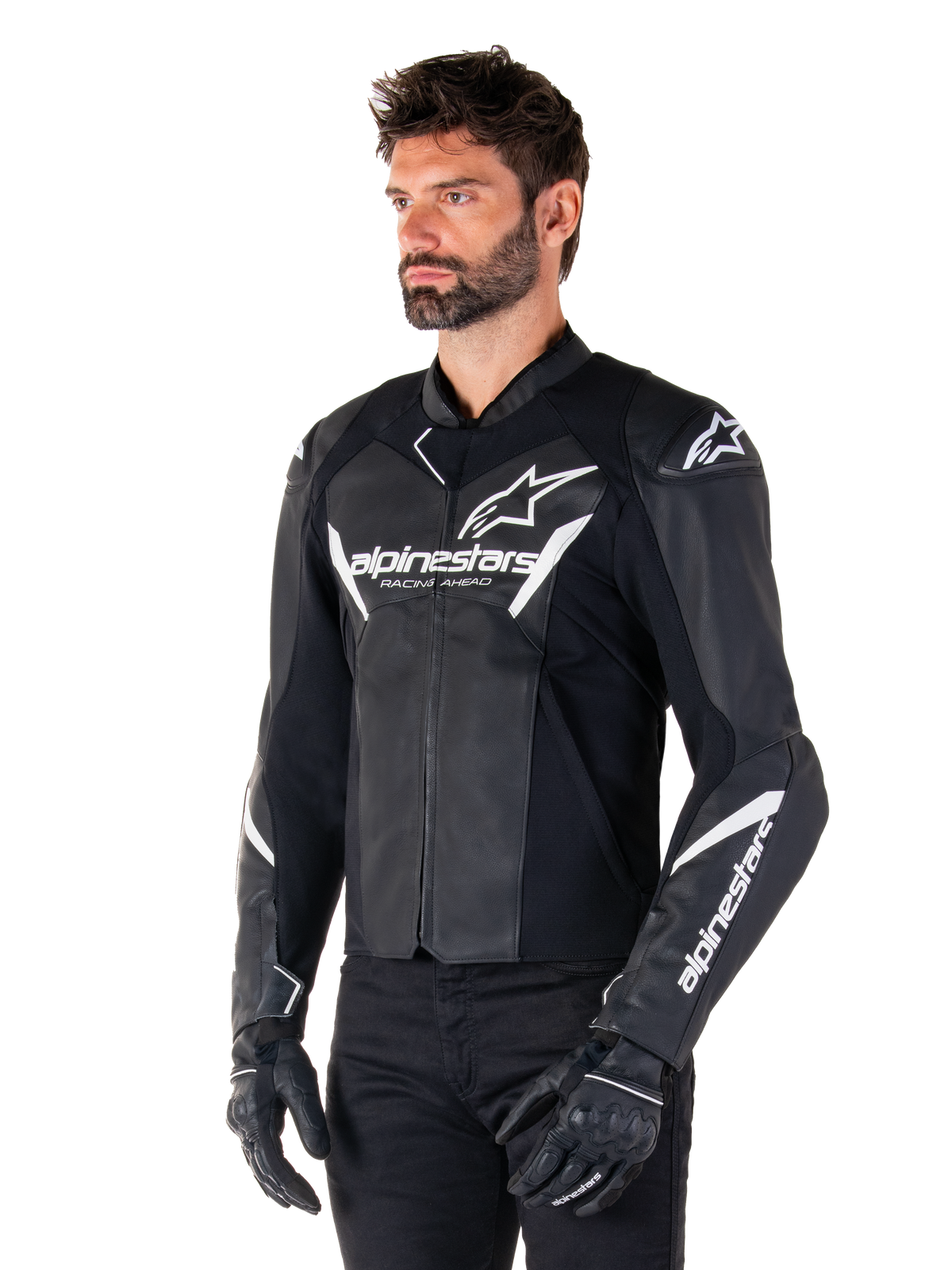 Alpinestars Faster V3 Leather Jacket, Sport Riding Motorcycle Jacket, Black and White, prominent white Alpinestars logo and 'Racing Ahead' text on the chest, star logos on the shoulders, premium leather construction with stretch panels, worn by a model with black pants and gloves