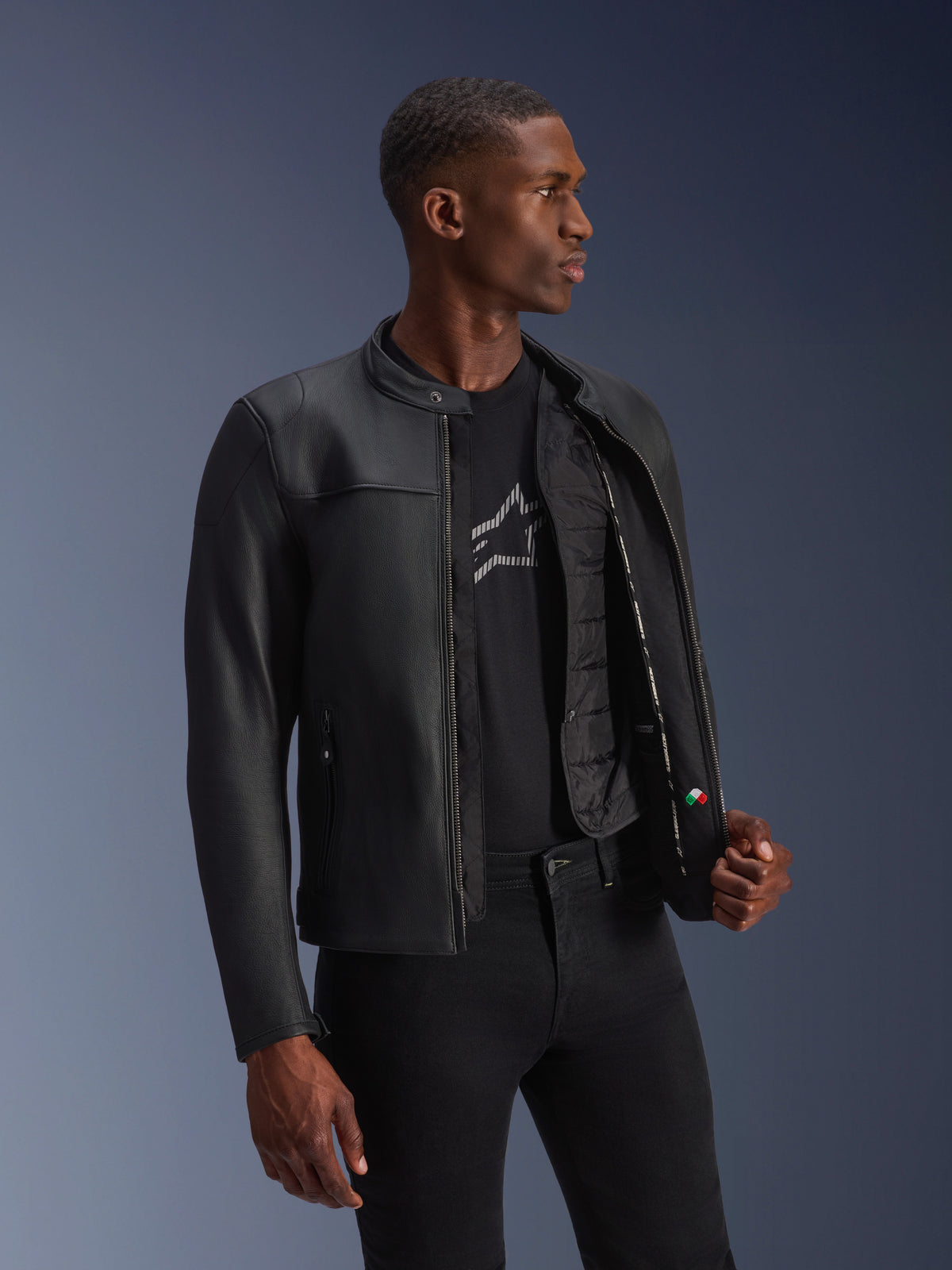 Alpinestars Blacktrack Leather Jacket, black bovine leather, unzipped on a model showing the thermal vest.