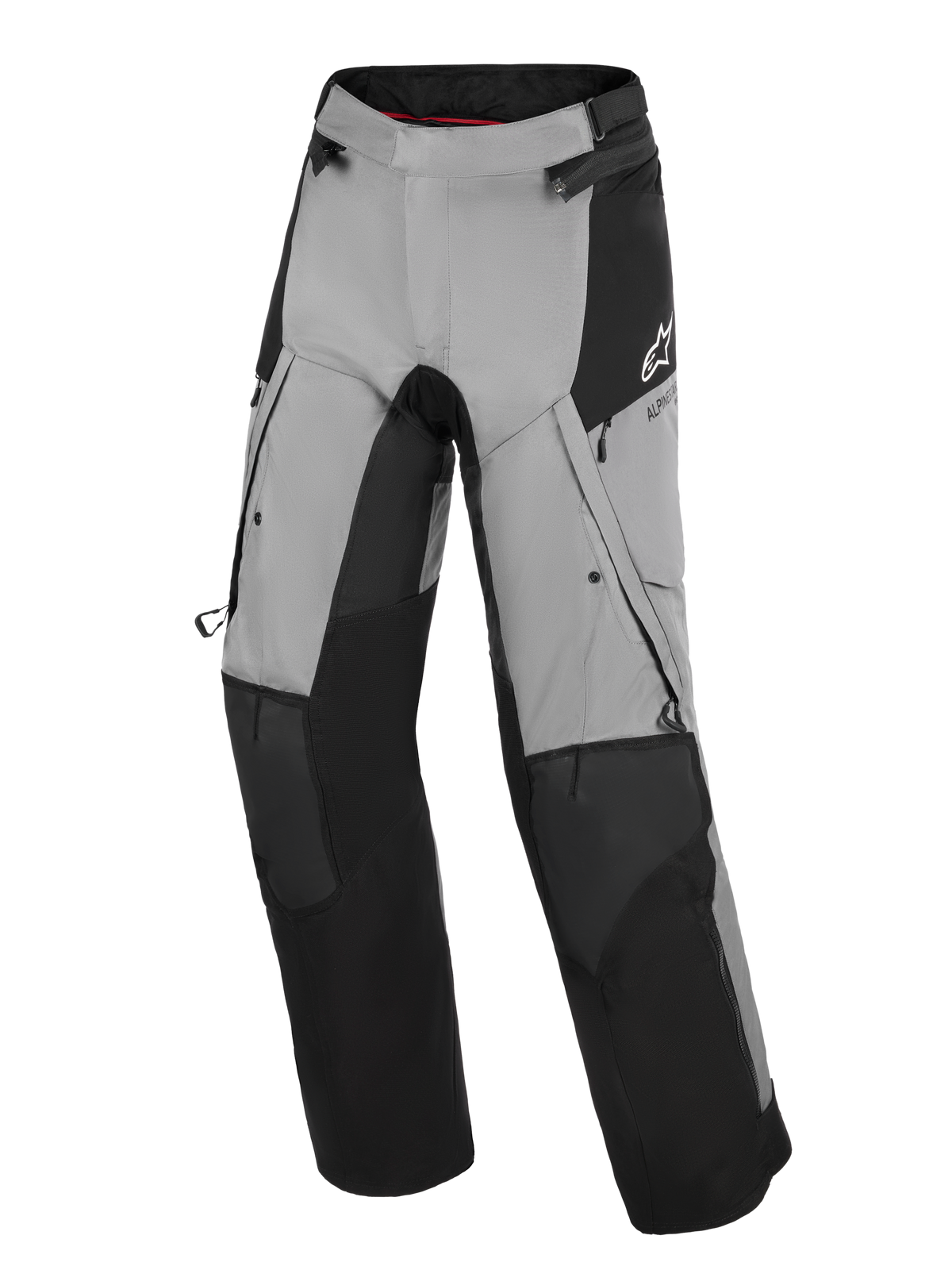 Alpinestars Andes V4 Drystar® broek, adventure motorbroek, zwart en donkergrijs, voorzien van verstevigde zwarte knie- en scheenbeenpanelen, ventilatieopeningen met rits op de dijen en cargozakken, met een wit Alpinestars-logo op de heup, ontworpen voor road- en adventure-ritten onder alle weersomstandigheden.
