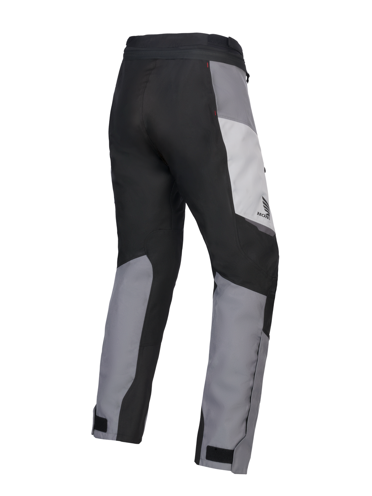 Alpinestars 2025 Honda Stella ST-1 Waterproof damesbroek, motor toerbroek voor dames, Ice Gray, Dark Gray en zwart, driekwart achteraanzicht met duurzame textielconstructie, grijs en zwart kleurgeblokte panelen, Honda-branding op de heup en verstelbare enkelafsluitingen.