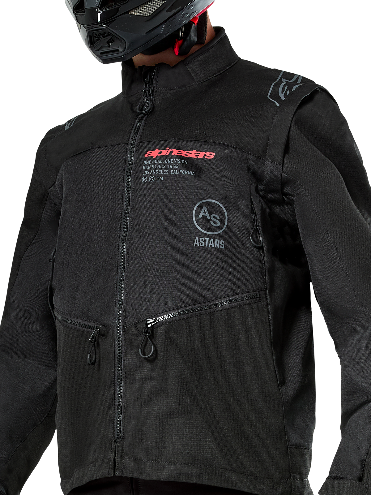 Alpinestars Pro-Dura jas, zwarte off-road motorjas met rode Alpinestars-branding en een grijs rond Astars-logo op de borst, steekzakken met ritssluiting en duurzame ripstop textielconstructie, rally-geïnspireerd ontwerp voor enduro-rijden.