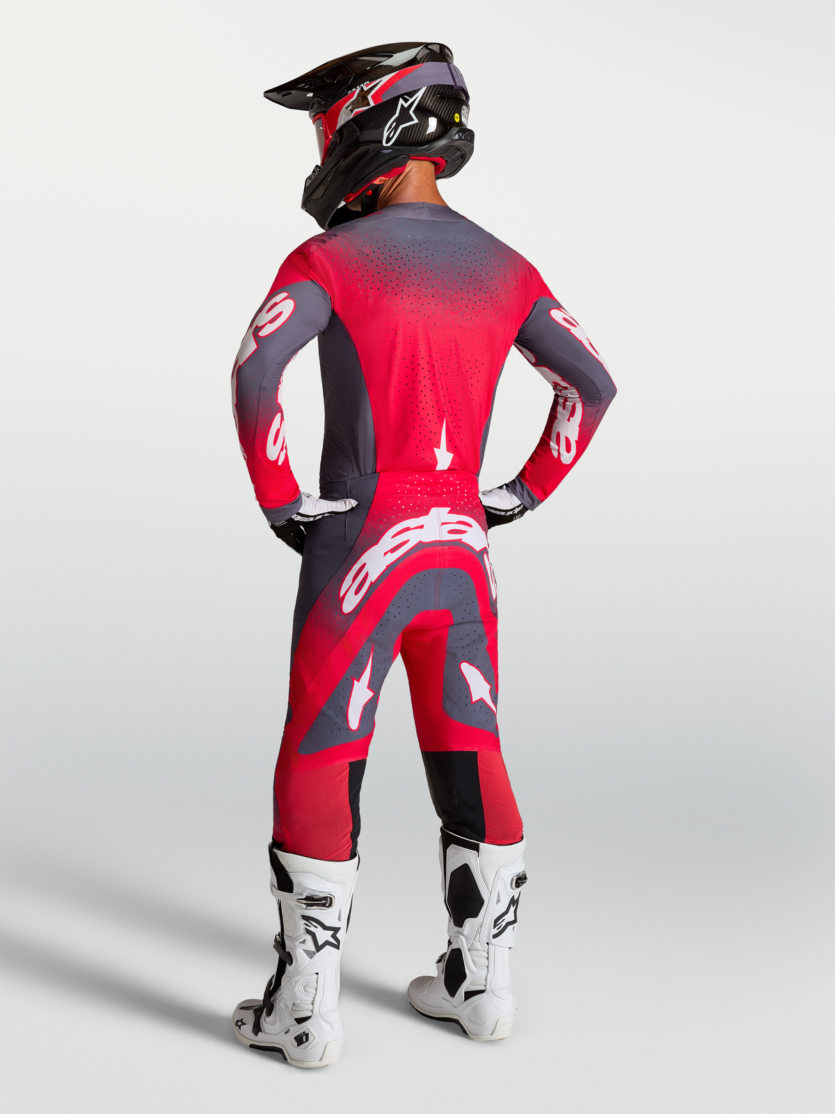 Alpinestars Supertech Hiten AFD broek, herenmotorcrossbroek, grijs en fluorescerend rood, atletische pasvorm, achteraanzicht.