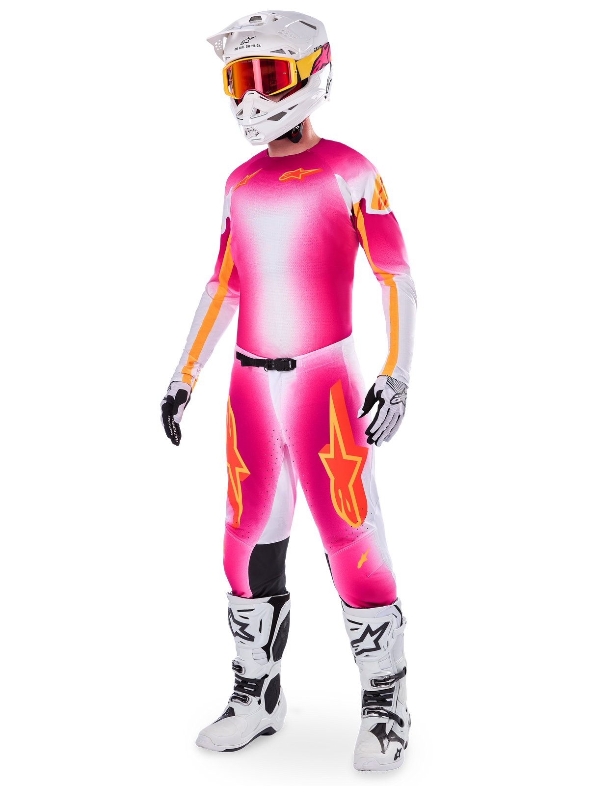 Motocross rider wearing the Alpinestars Supertech AFD MIG Limited Edition Gear Set, Pink Fluo White and orange gradient jersey and pants, white helmet with orange goggles, white and black boots, professional dirt riding apparel