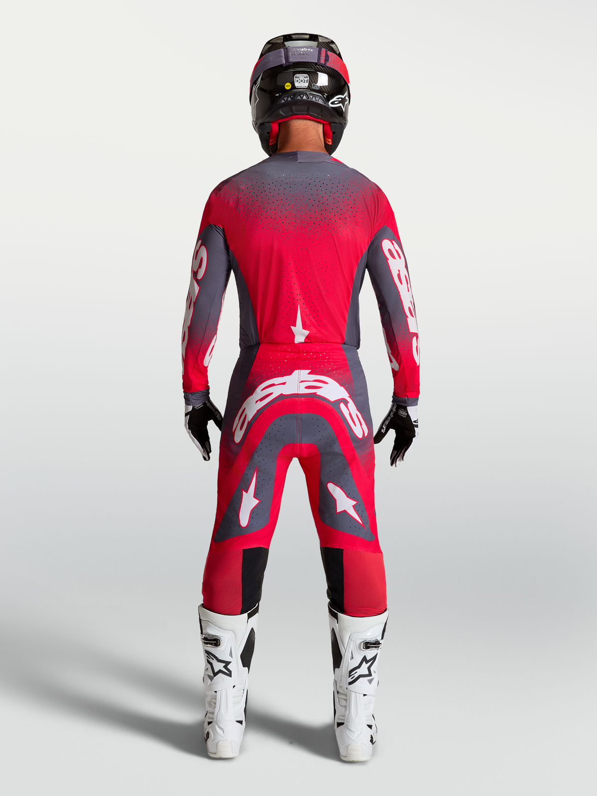 Alpinestars Supertech Hiten AFD jersey, professionele motorcrossuitrusting, rood fluo en grijs, achterzijde op model.