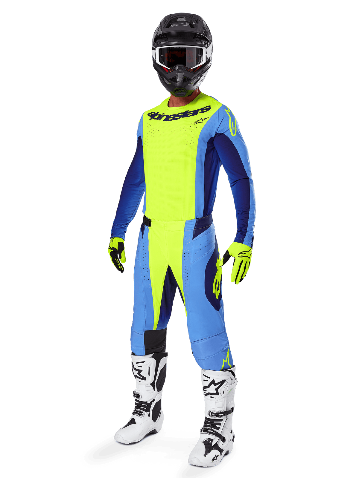 Motocrossrijder draagt Alpinestars 2025 Techstar Melt Jersey, fluorgeel en blauw, gecombineerd met bijpassende broek, zwarte helm met crossbril, gele handschoenen en wit-zwarte laarzen, complete gecoördineerde uitrusting voor off-road racen