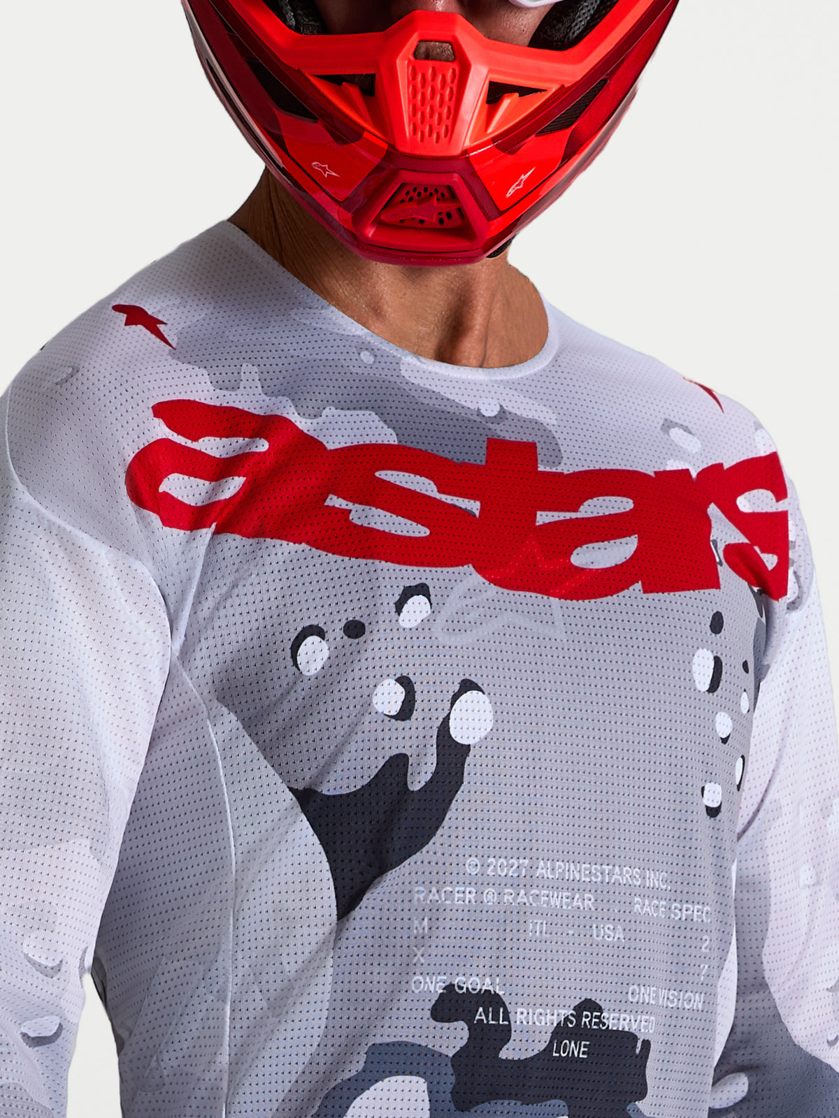 Alpinestars Racer Air Lone jersey, heren-motocrossjersey, grijs camo en rood, geventileerde meshconstructie.