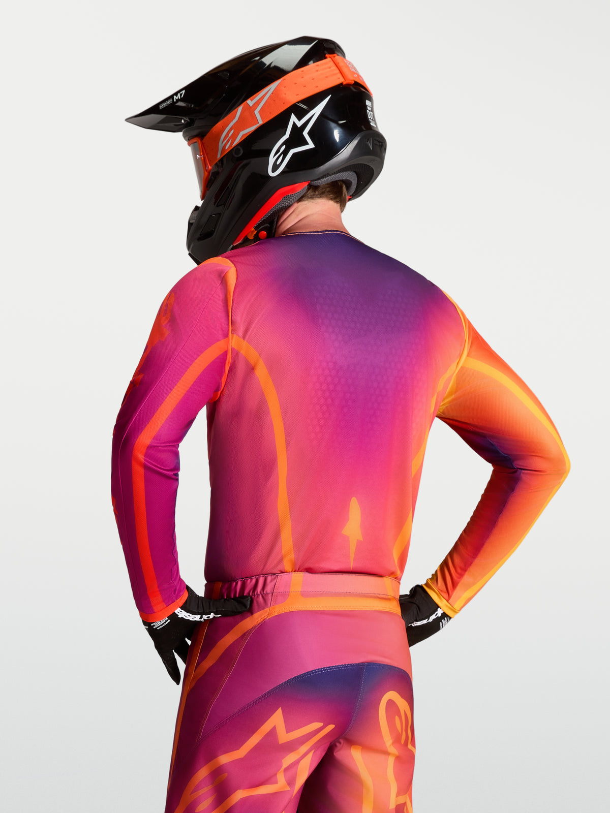 Alpinestars Fluid Kepler Jersey, paars en oranje heren MX-jersey met ergonomische atletische pasvorm, achteraanzicht.