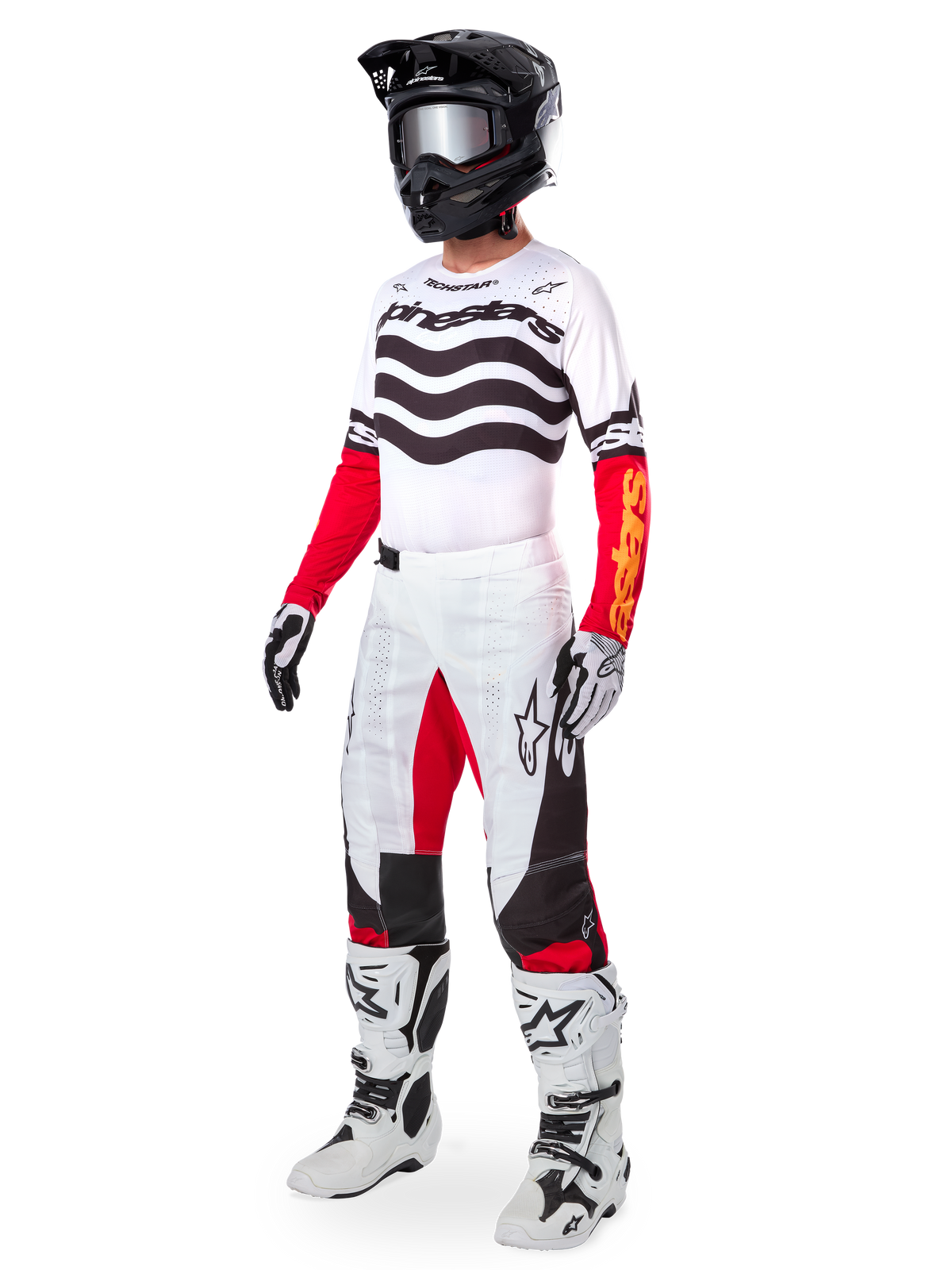Alpinestars Limited Edition Techstar Deep uitrustingsset, volledige motorcross racekleding, wit jersey met zwarte golfpatronen en rode mouwen, witte broek met rode en zwarte accenten, zwarte helm met zilveren crossbril, wit-zwarte handschoenen, witte laarzen, gecoördineerde MX-raceoutfit