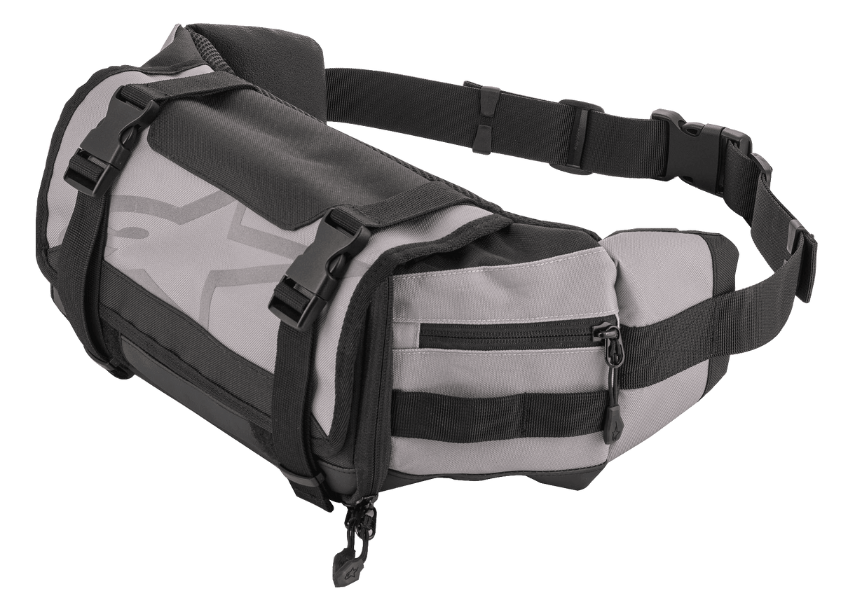 Alpinestars Tech Tool Pack, grijze en zwarte enduro heuptas, opbergtas voor motorgereedschap, verstelbare riemen met plastic gespen, groot sterlogo, duurzame textielconstructie, compact ontwerp