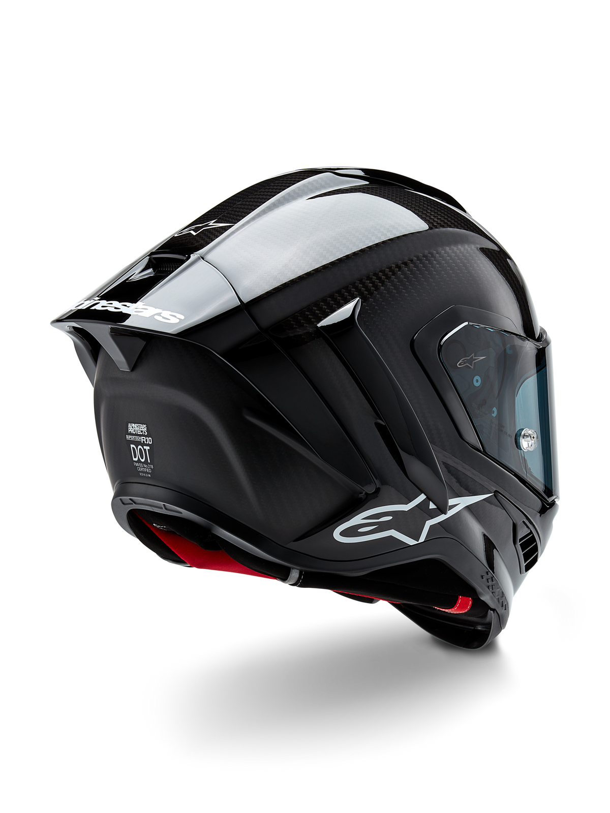 Alpinestars Supertech R10 Solid helm, motorracehelm, zwart carbon met mat en glanzende afwerking, driekwart achteraanzicht met koolstofvezel schaal, aerodynamische spoiler en Alpinestars-branding.