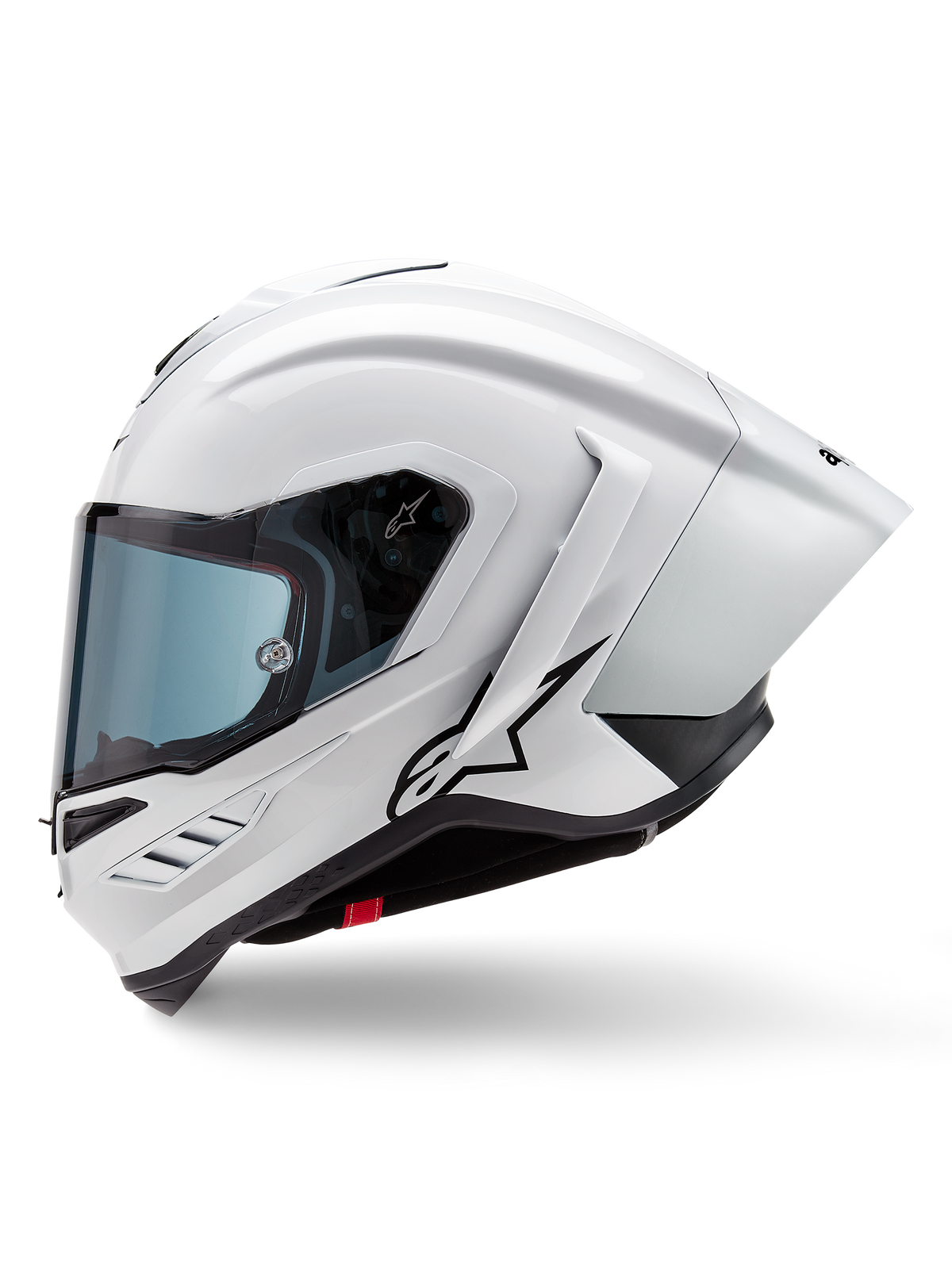 Alpinestars Supertech R10 Solid helm, integraal racehelm, glanzend wit en mat zwart, zijprofiel met geïntegreerde aerodynamische spoiler en getint vizier, voorzien van een zwart Alpinestars sterlogo.