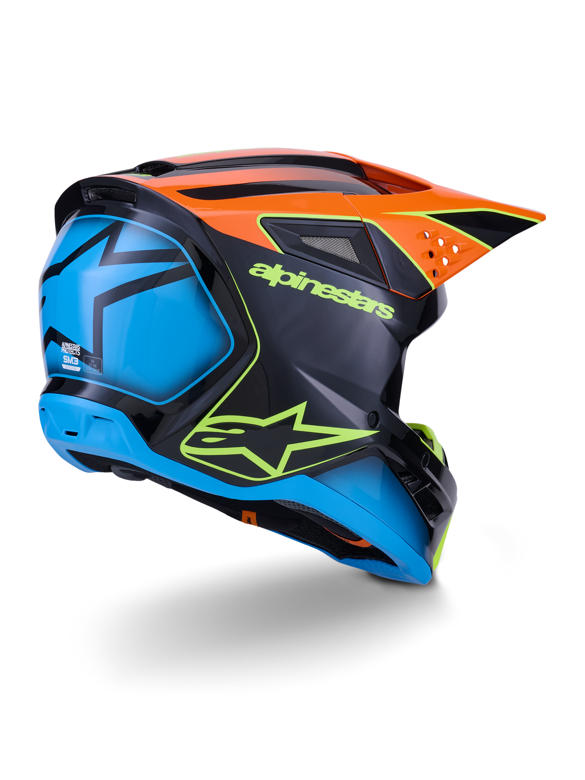 Alpinestars S-M3 Fray Helm ECE 22.06, motorcrosshelm, zwart met oranje en blauwe panelen, voorzien van neongeel Alpinestars-logo, groot blauw achtergedeelte met ster-graphic, oranje vizier met geïntegreerde ventilatieopeningen, professionele off-road beschermingsuitrusting