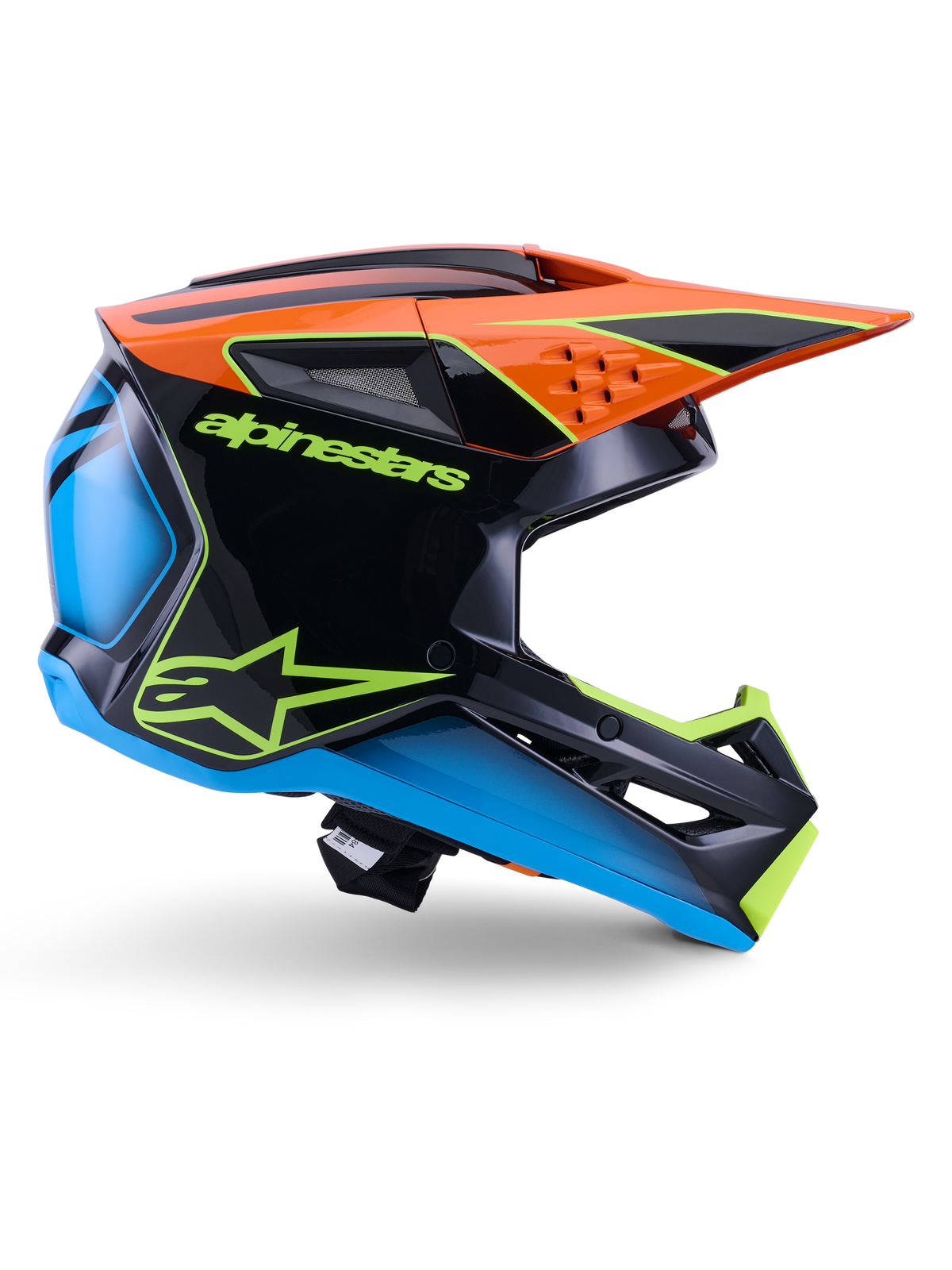 Alpinestars S-M3 Fray Helm ECE 22.06, motorcrosshelm, zwart, oranje, blauw en neongeel, zijprofiel van een glanzende aerodynamische schaal met een opvallende oranje klep, neongroene branding en blauwe accenten, off-road racebescherming