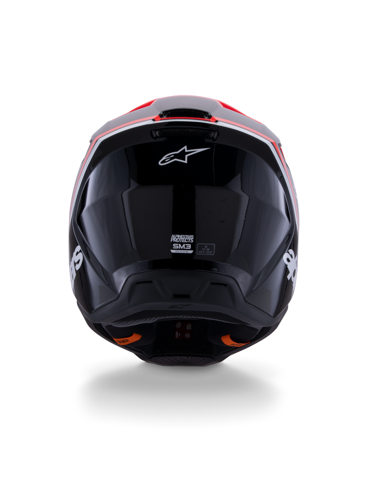Alpinestars S-M3 Radium Helm ECE 22.06, motorcrosshelm, glanzend zwart met rood fluo en witte accenten, achteraanzicht met het aerodynamische schaalontwerp, wit sterlogo en certificeringslabels.