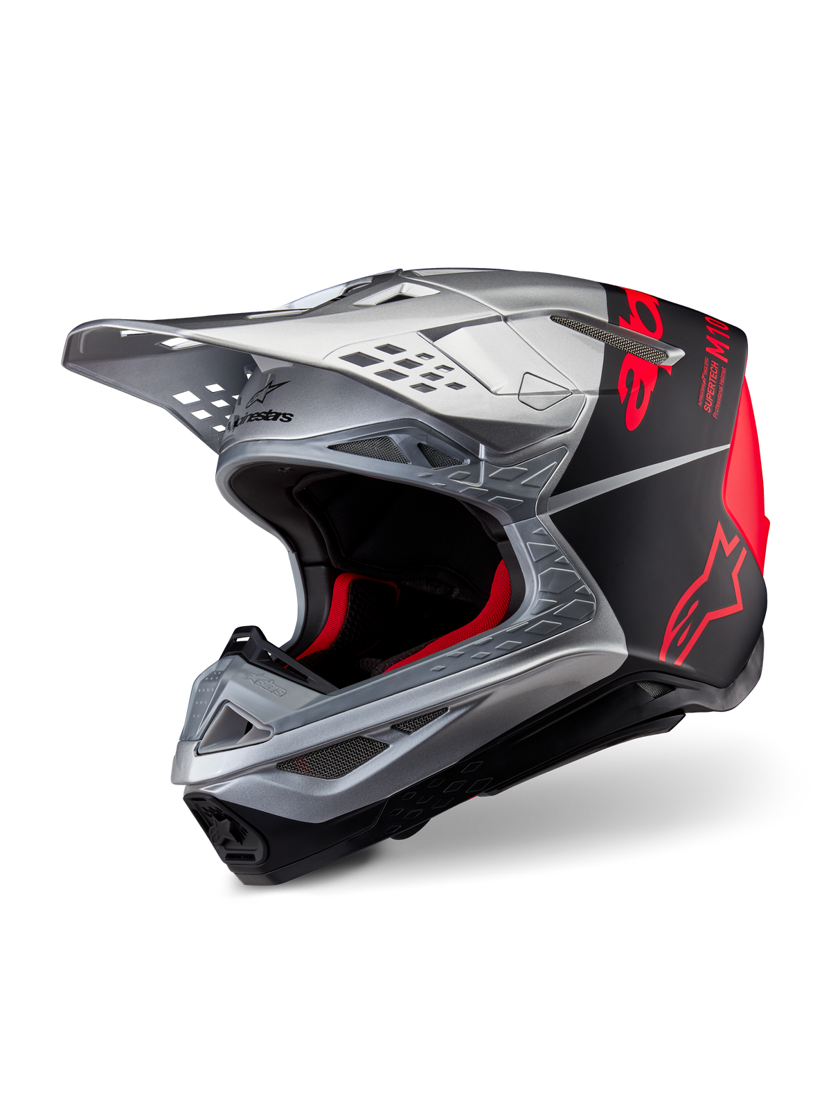 Alpinestars Supertech M10 Flood ECE 22.06 helm, motorcrosshelm, zilver, zwart en fluo oranje, matte en glanzende afwerking, voorzien van een gestroomlijnde carbon schaal met opvallende Alpinestars-branding en meerdere ventilatieopeningen
