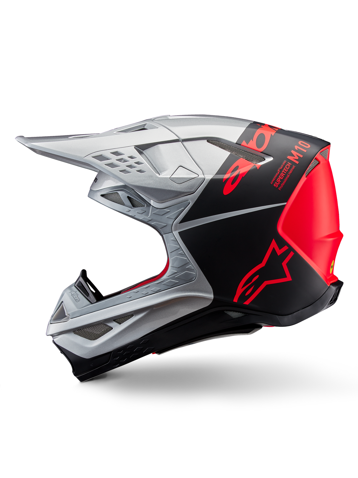Alpinestars Supertech M10 Flood helm, motorcrosshelm, zilver en zwart met fluoriserend oranje accenten, zijprofiel, strak aerodynamisch ontwerp met ventilatieopeningen, matte en glanzende afwerking, professionele off-road racebescherming