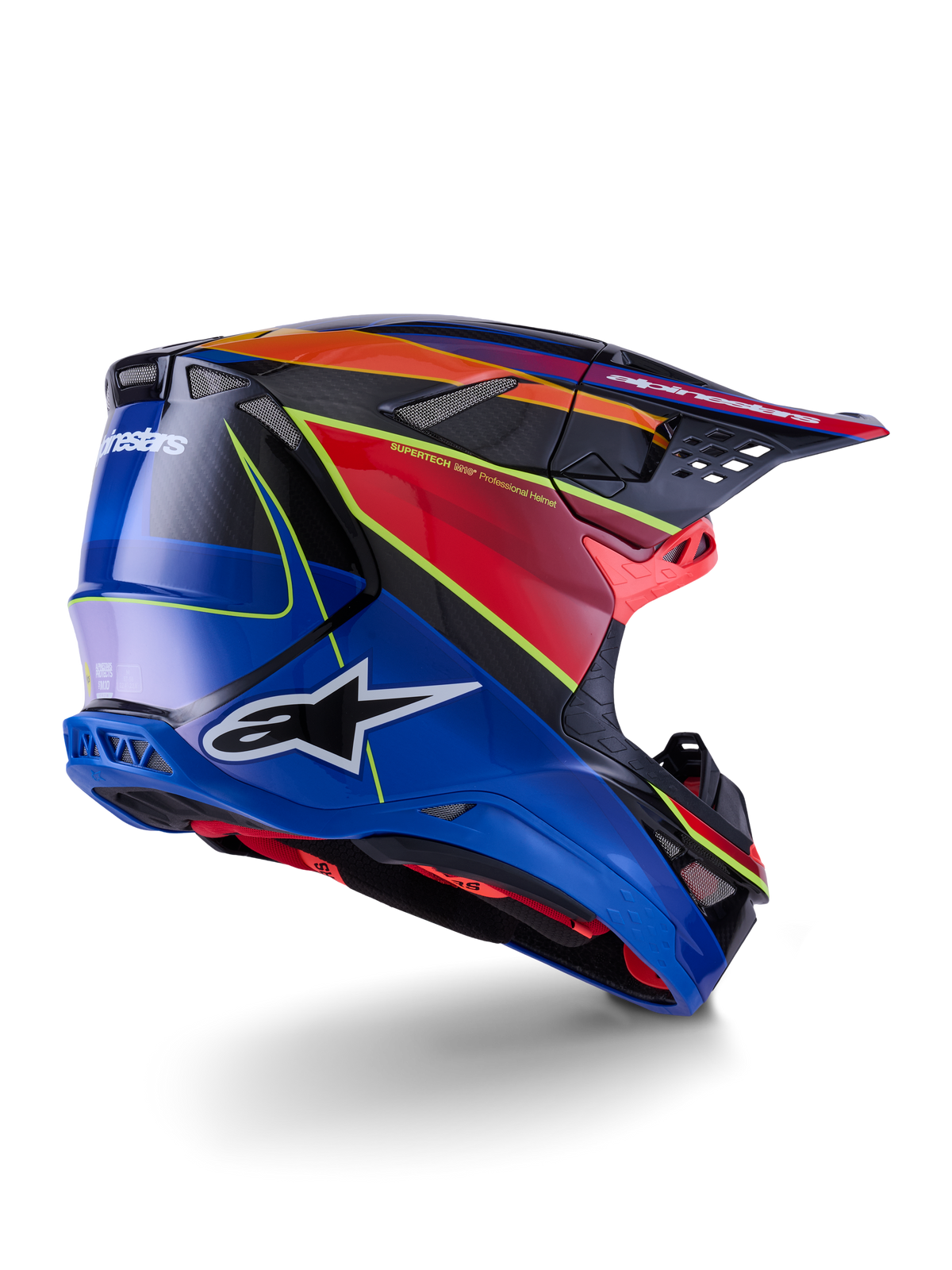 Alpinestars Supertech M10 Era Helm, motorcrosshelm, blauw, rood en fluogeel glanzend, achter-zijprofiel met carbonvezel details, opvallende Alpinestars-branding, geïntegreerde ventilatieopeningen en hoogglans afwerking voor off-road prestaties.