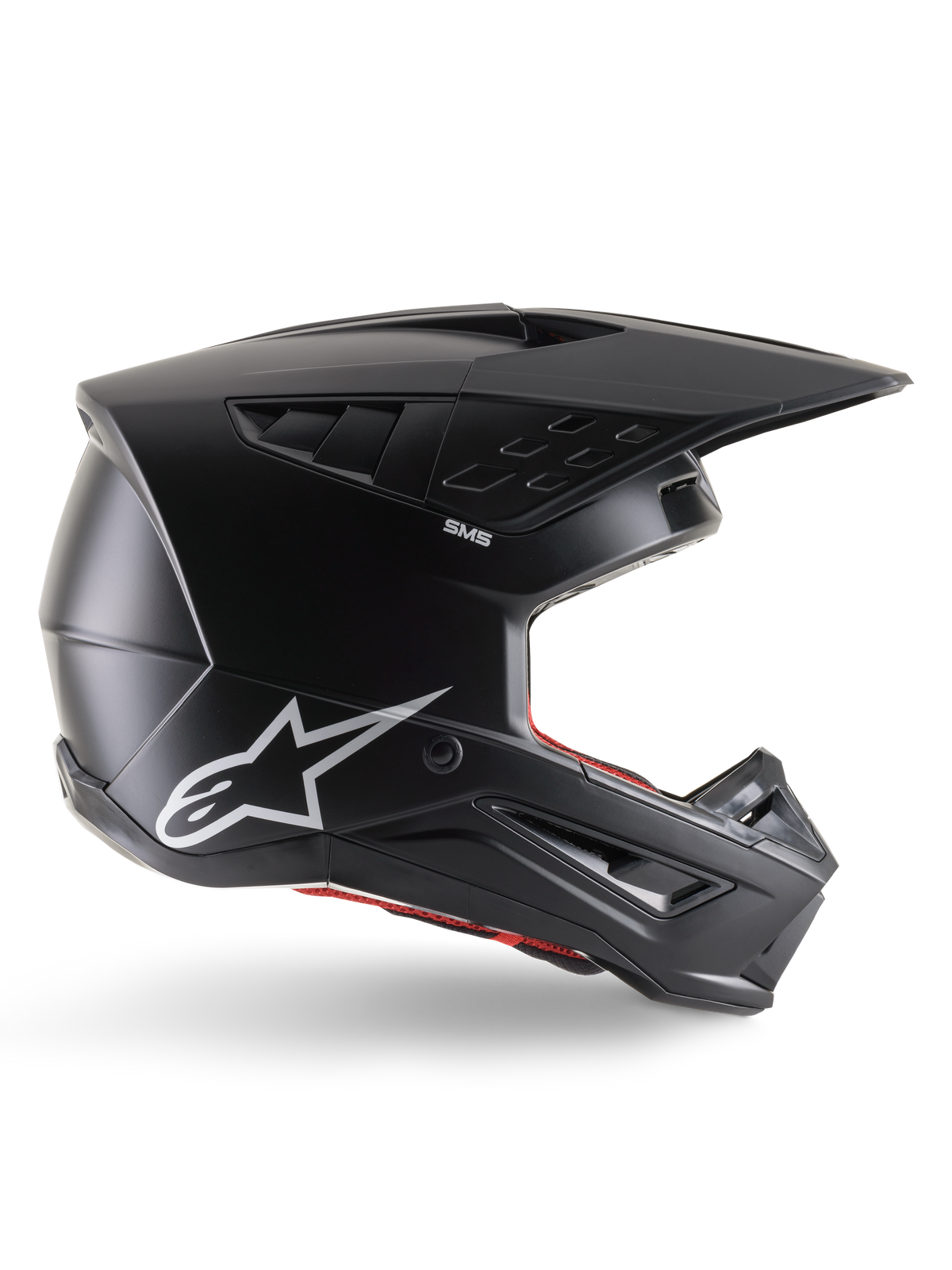 Alpinestars S-M5 Solid helm, motorcrosshelm, matzwart, voorzien van wit Alpinestars sterlogo en rode binnenvoering, aerodynamisch ontwerp met meerdere ventilatieopeningen en lang vizier, ECE 22.06 gecertificeerde off-road bescherming
