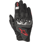 Alpinestars SMX-1 Air V2 motorhandschoenen, zwart en fluo rood, met een harde knokkelbeschermer in carbonstijl, rood Alpinestars-sterlogo, zilveren reflecterende strepen, geperforeerd leer en ademende mesh-panelen.