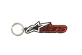 Alpinestars Blaze sleutelhanger, 3D rubberen sleutelhanger in zwart en rood, met het wit-zwarte sterlogo en rood omrande tekst, duurzame metalen drukring, motorsport-geïnspireerd accessoire