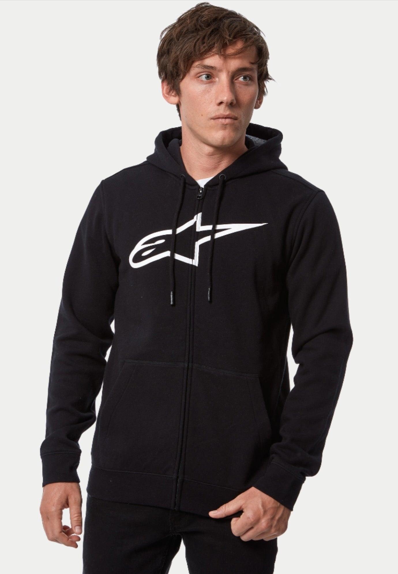 Alpinestars Ageless Zip V3 Hoodie, hoodie met ritssluiting aan de voorzijde, zwart en wit, voorzien van een groot wit Alpinestars-logo op de borst, capuchon met trekkoord en een volledige ritssluiting, casual lifestyle streetwear