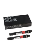 Alpinestars Tech-Air 3 V2 airbag-systeem vervangende patronen, twee zwarte cilindrische argongas-inflatoren met rode waarschuwingslabels, zwarte Tech-Air Inflator Kit-doos met zilveren Alpinestars-branding, essentiële onderhoudskit voor motorairbag-systemen