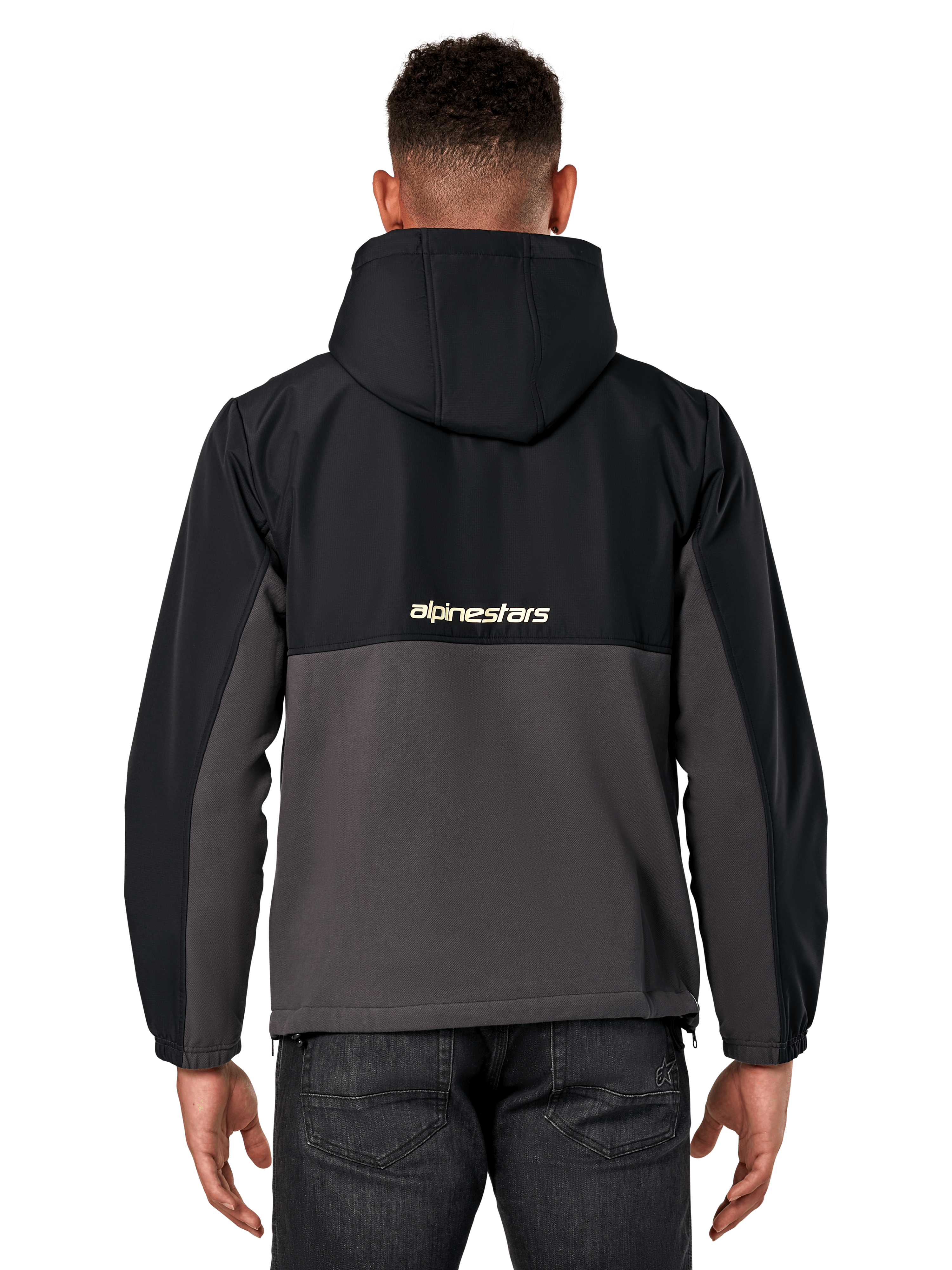 Alpinestars Juncture Hybrid jas, achteraanzicht, zwart en gunmetal, casual sportswear anorak met een mix van materialen, ripstop bovenzijde en canvas fleece onderzijde, Alpinestars-logo op de rug, gedragen met een donkere broek
