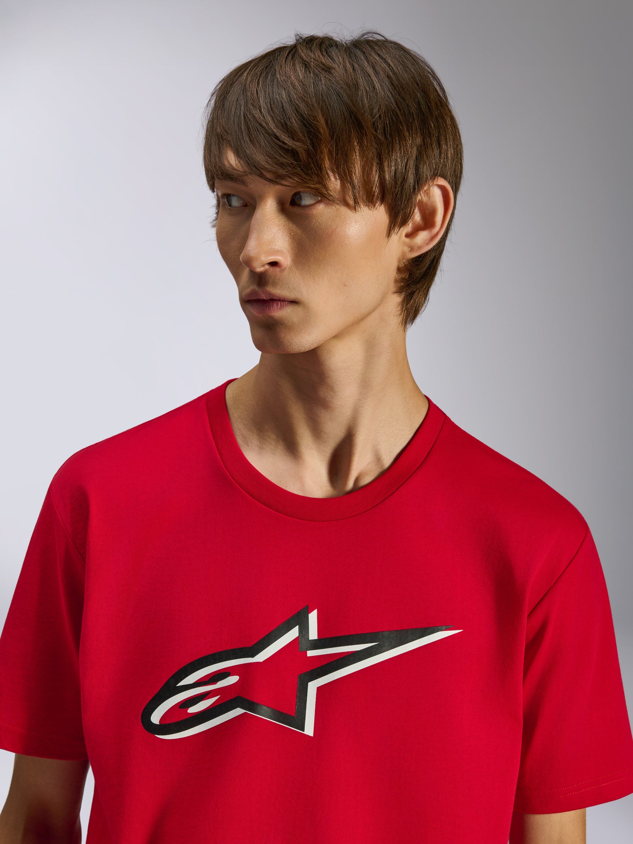 Alpinestars Ageless Shadow CSF Tee, Short Sleeve T-Shirt, Red, Front Ageless star logo with black and white shadow effect, worn by a model, casual motorsport-inspired design