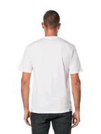 Alpinestars Blaze 2.0 CSF Tee, T-shirt met korte mouwen, wit marineblauw, achteraanzicht van een man die een effen wit T-shirt draagt met een zwarte broek, casual motorsport streetwear