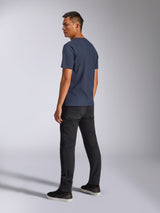 Alpinestars Blaze 2.0 CSF Tee, Short Sleeve T-Shirt, Navy Blue, back view on model, paired with black pants and sneakers, casual motorsport-inspired streetwear