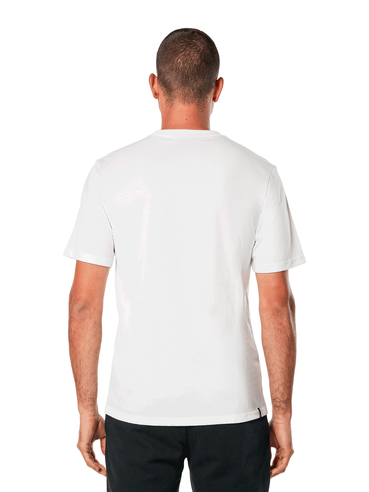 Alpinestars MX Helmet CSF Tee, T-shirt met korte mouwen, wit, achteraanzicht, gedragen met zwarte broek, casual motorsport-geïnspireerd ontwerp